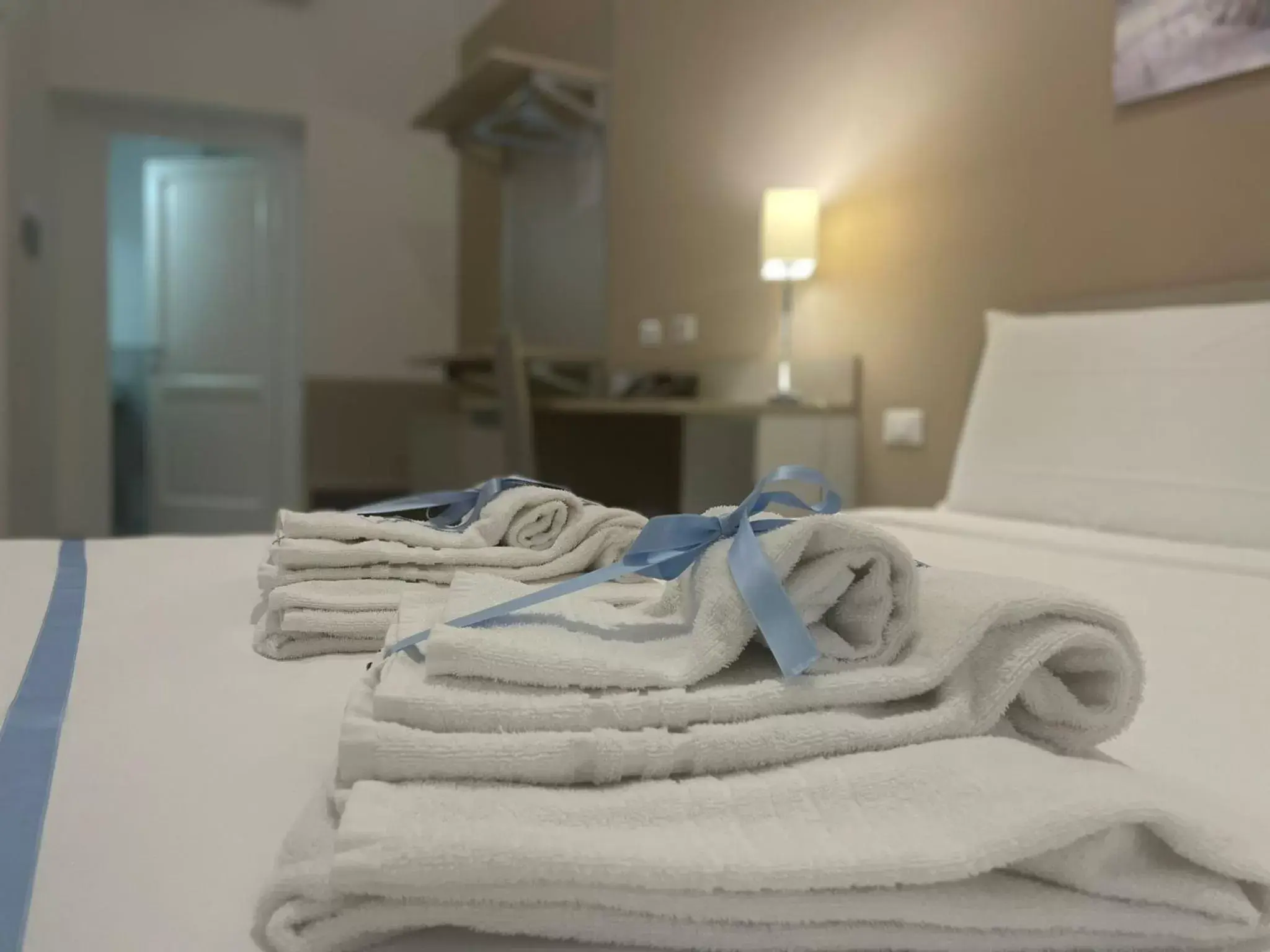 towels, Bed in Le Quattro Stagioni - Rooms & Suite