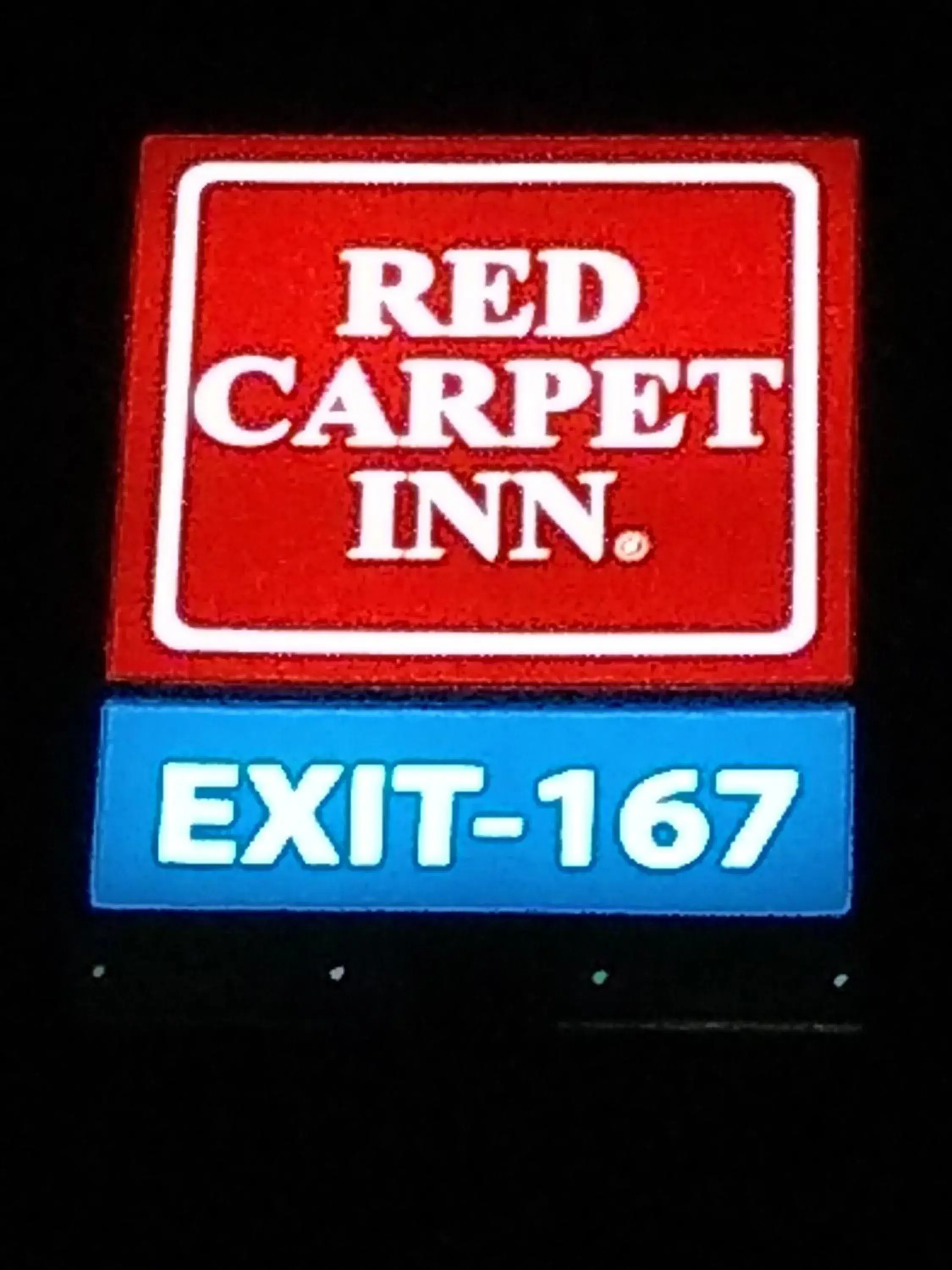 Property logo or sign in Red Carpet Inn-Macon
