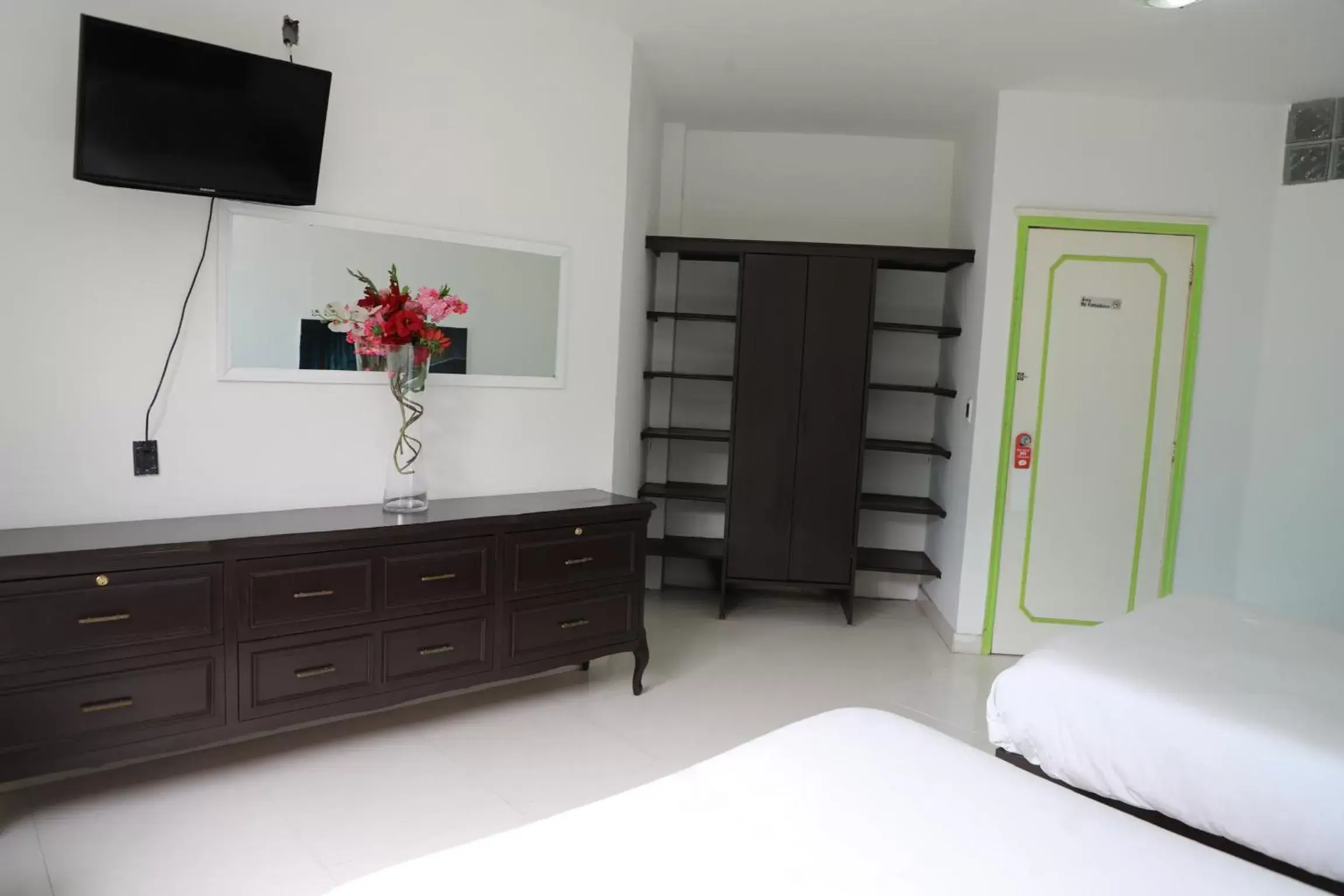 Bedroom, TV/Entertainment Center in Hotel Maragreens