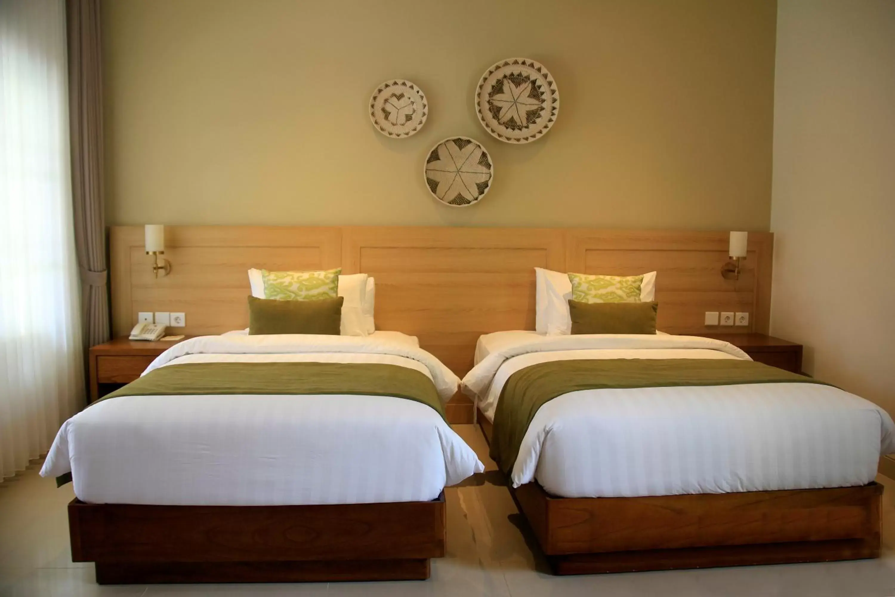 Bed in The Cakra Hotel