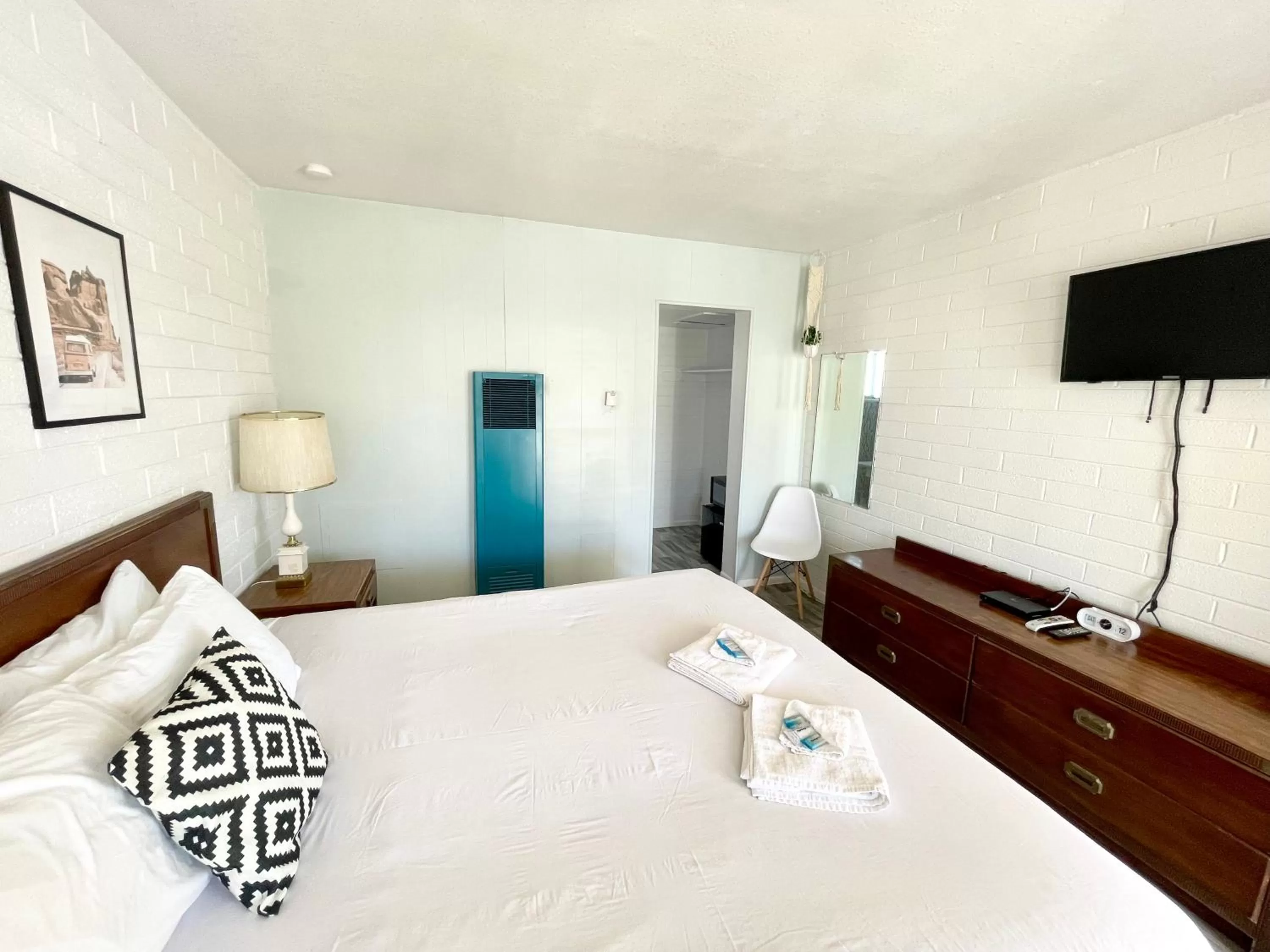 Bed in The Postcard Motel