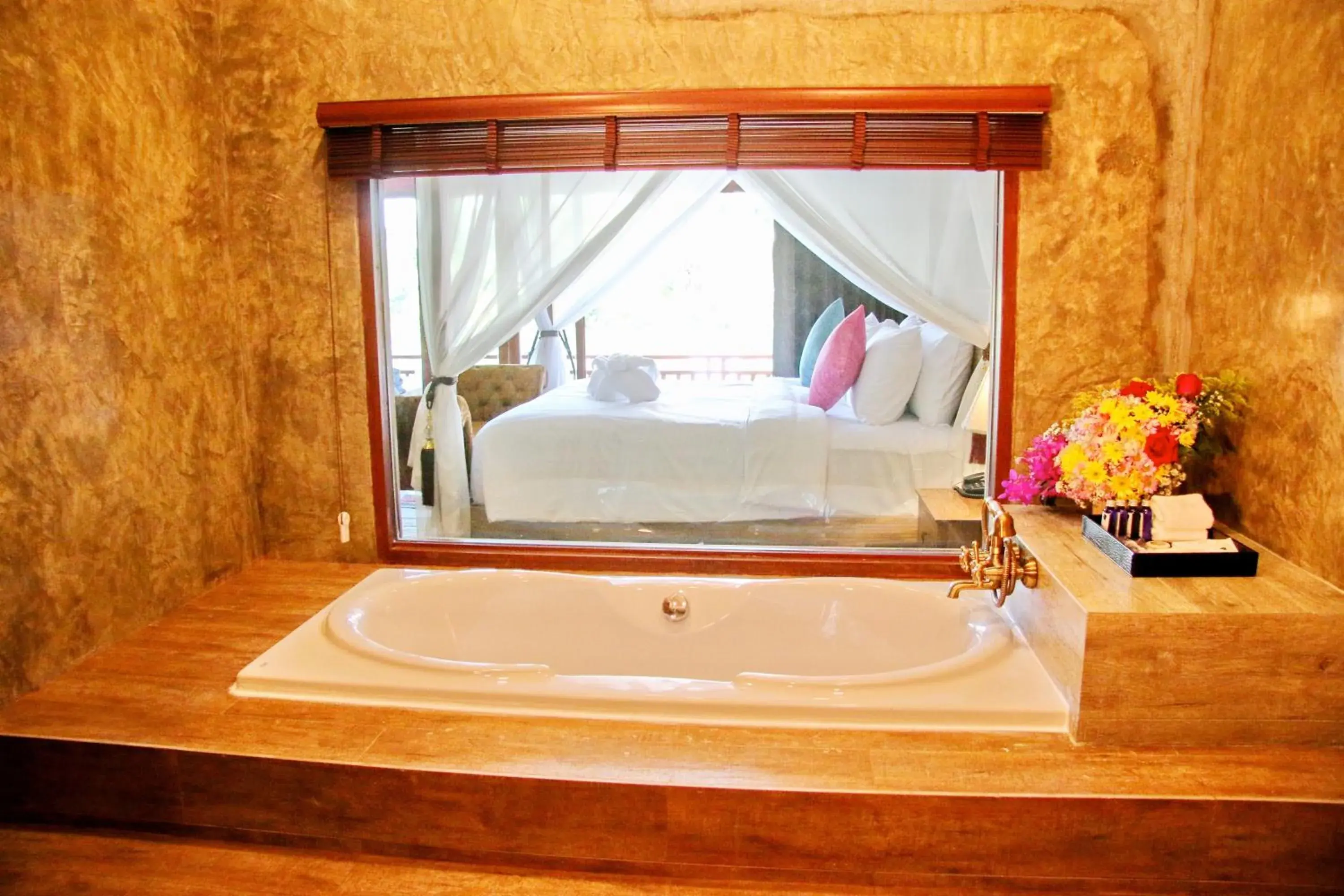 Bed, Bathroom in The Chaya Resort and Spa