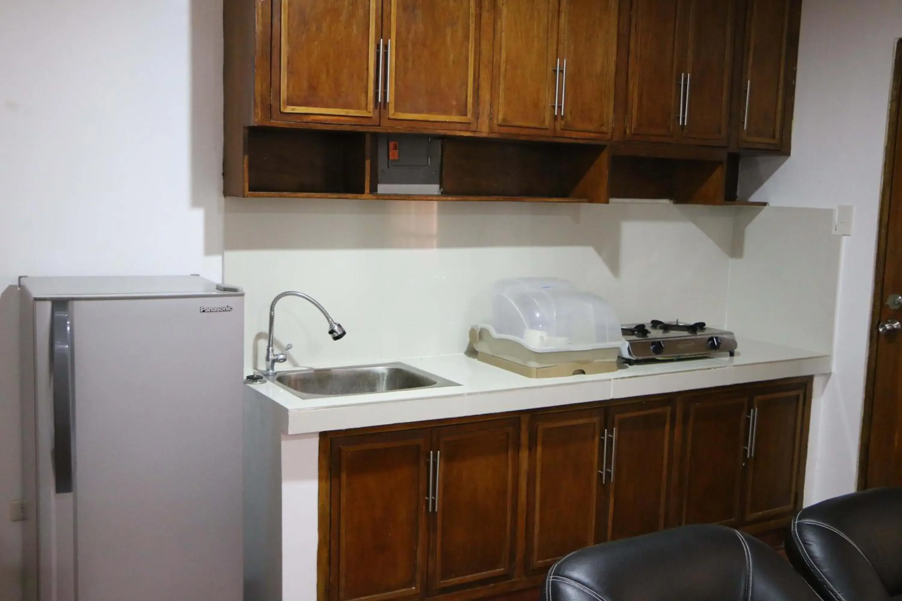 kitchen, Kitchen/Kitchenette in Badladz Staycation Condos