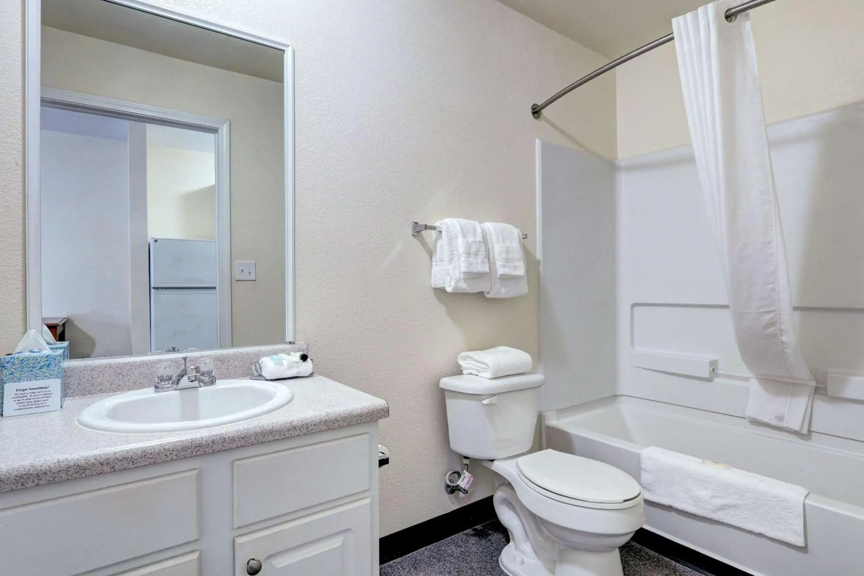 Photo of the whole room, Bathroom in Suburban Studios Westminster Denver North