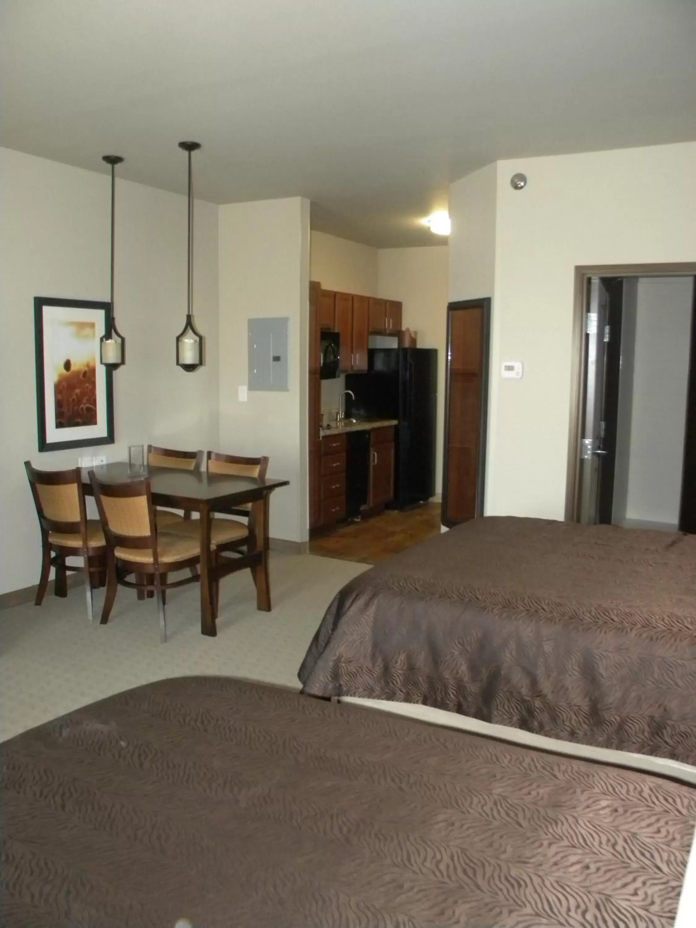 Bed in Teddy's Residential Suites Watford City