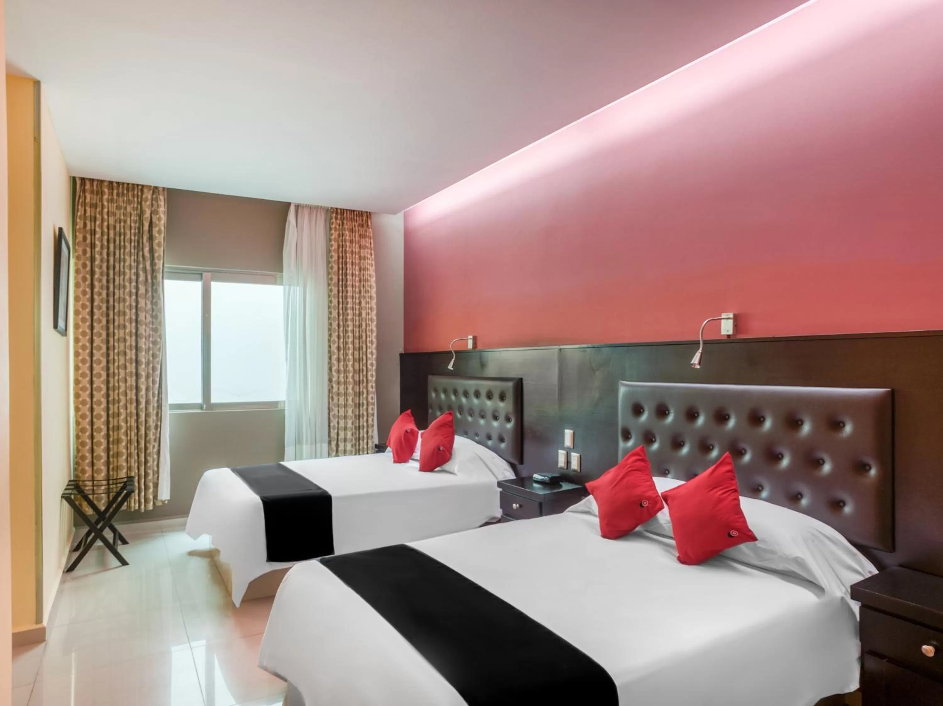 Bed in Veracruz Suites Hotel