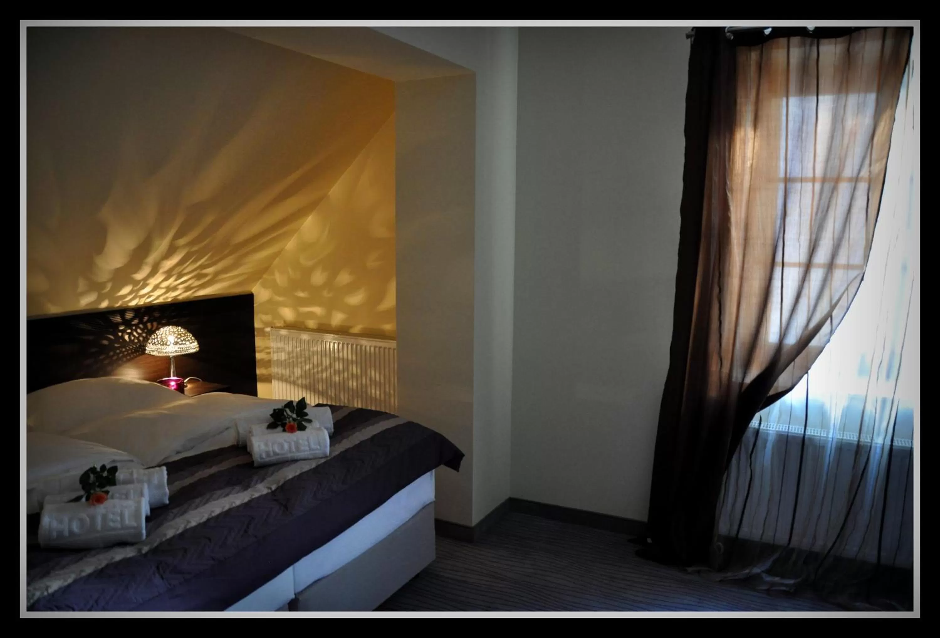 Bed in Hotel Willa Adriana