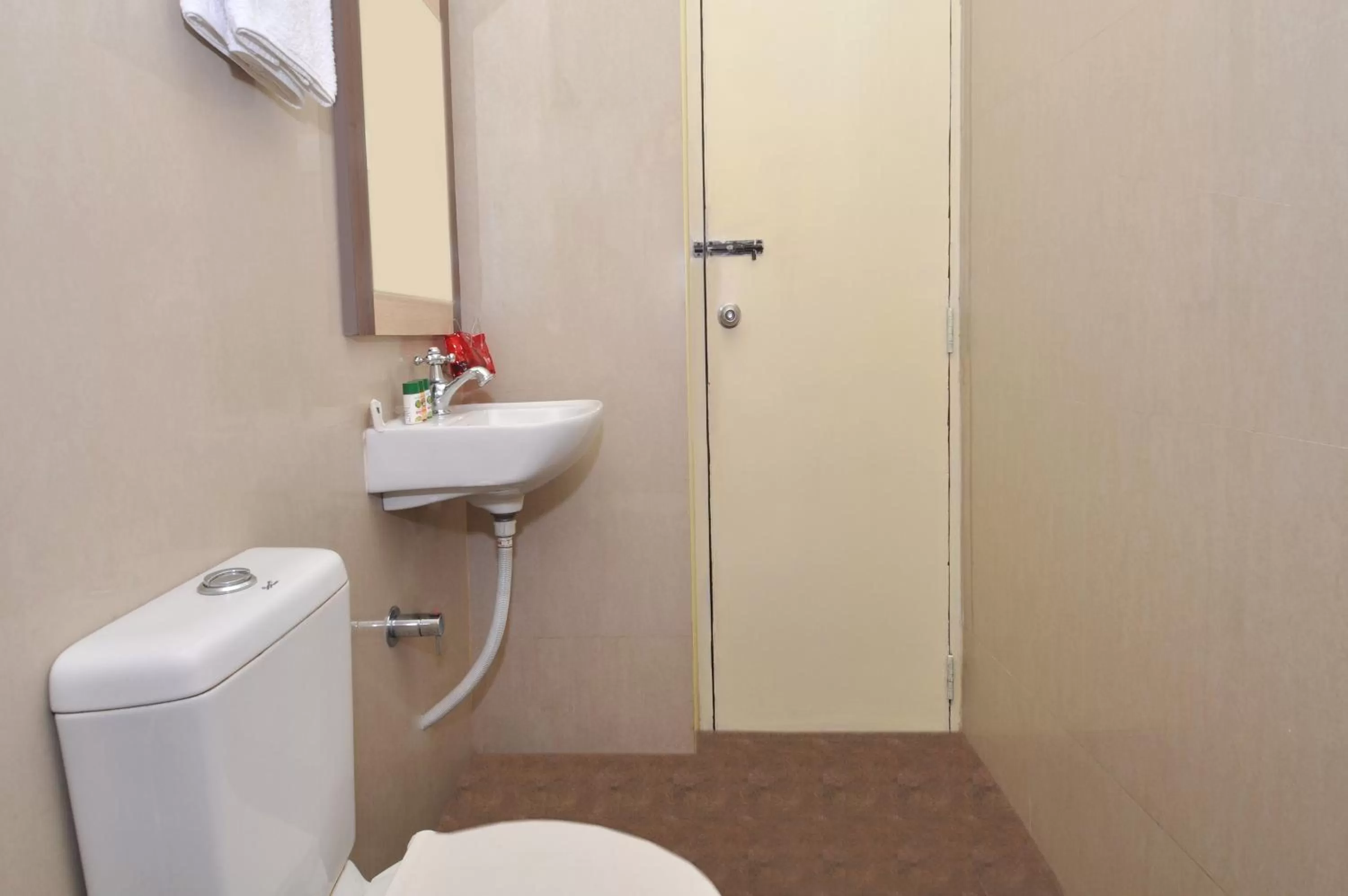 Bathroom in Sivamurugan Hotels