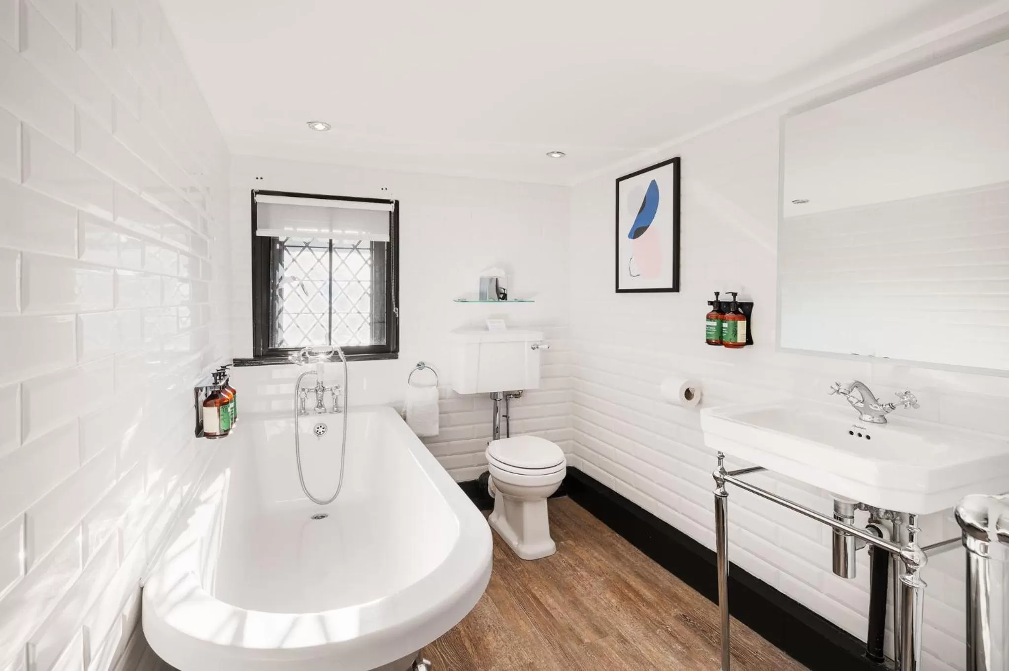 Bathroom in voco Lythe Hill Hotel & Spa by IHG