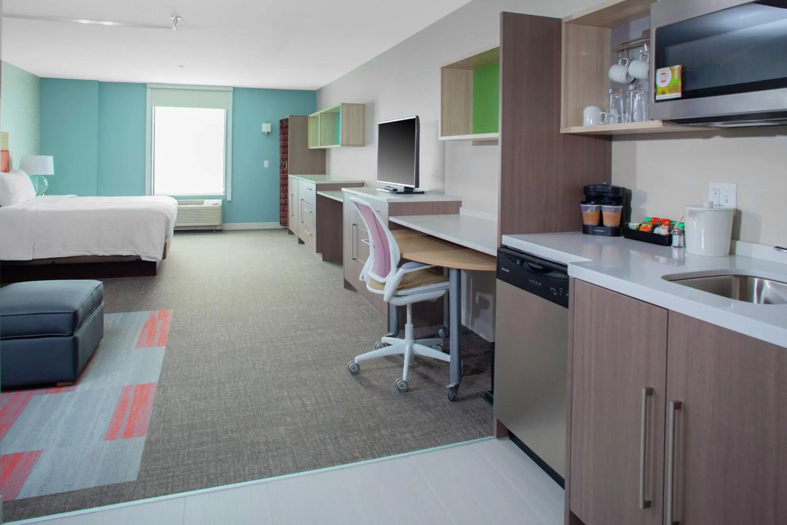 Bedroom, Kitchen/Kitchenette in Home2 Suites by Hilton Bloomington