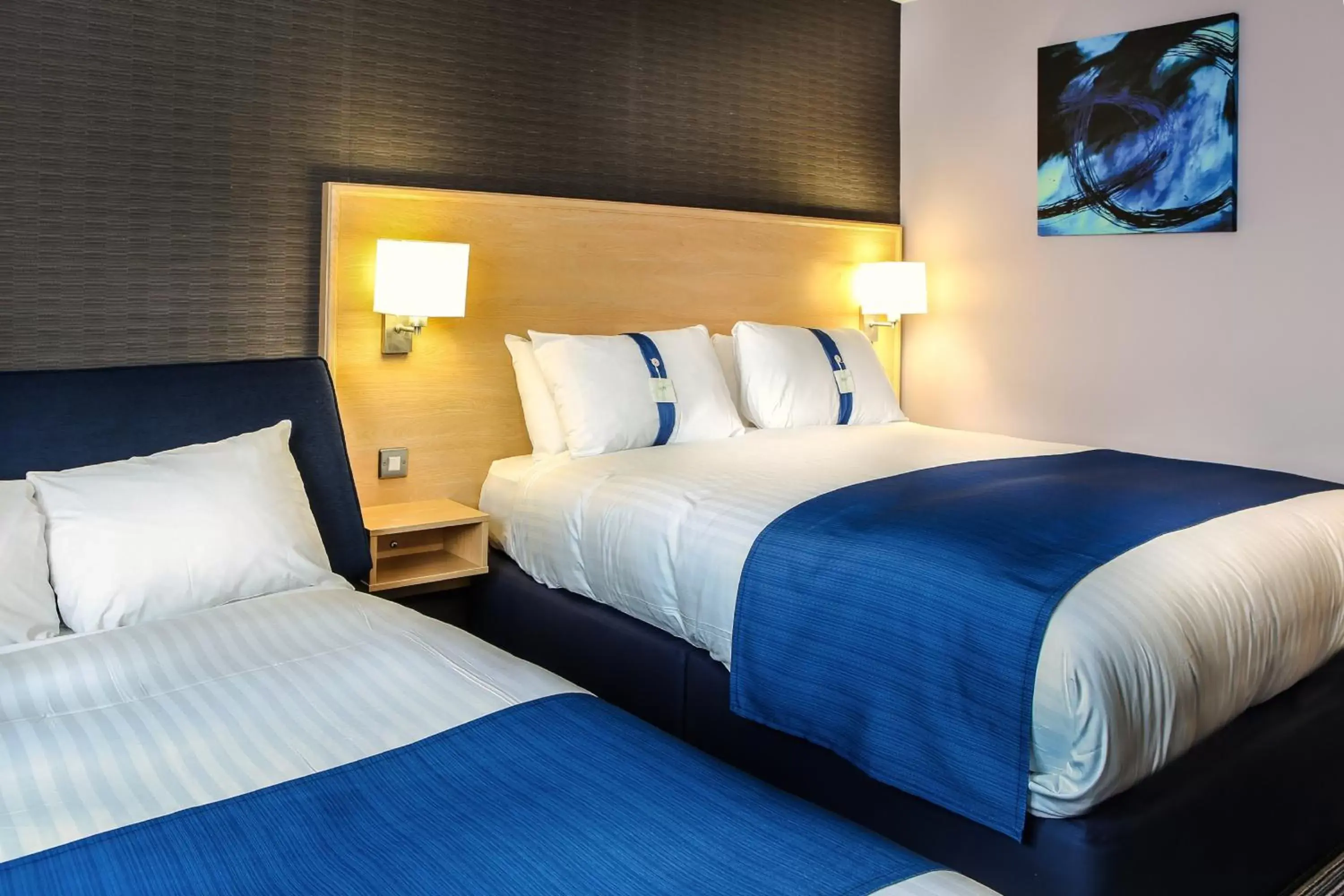 Photo of the whole room, Bed in Holiday Inn Express Manchester Airport, an IHG Hotel