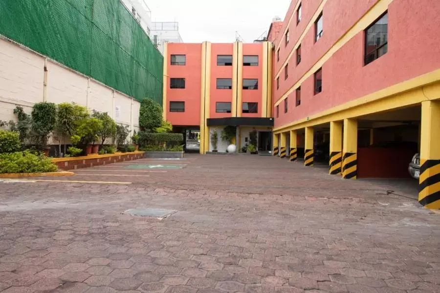 Parking, Property Building in Hotel Rossel Plaza