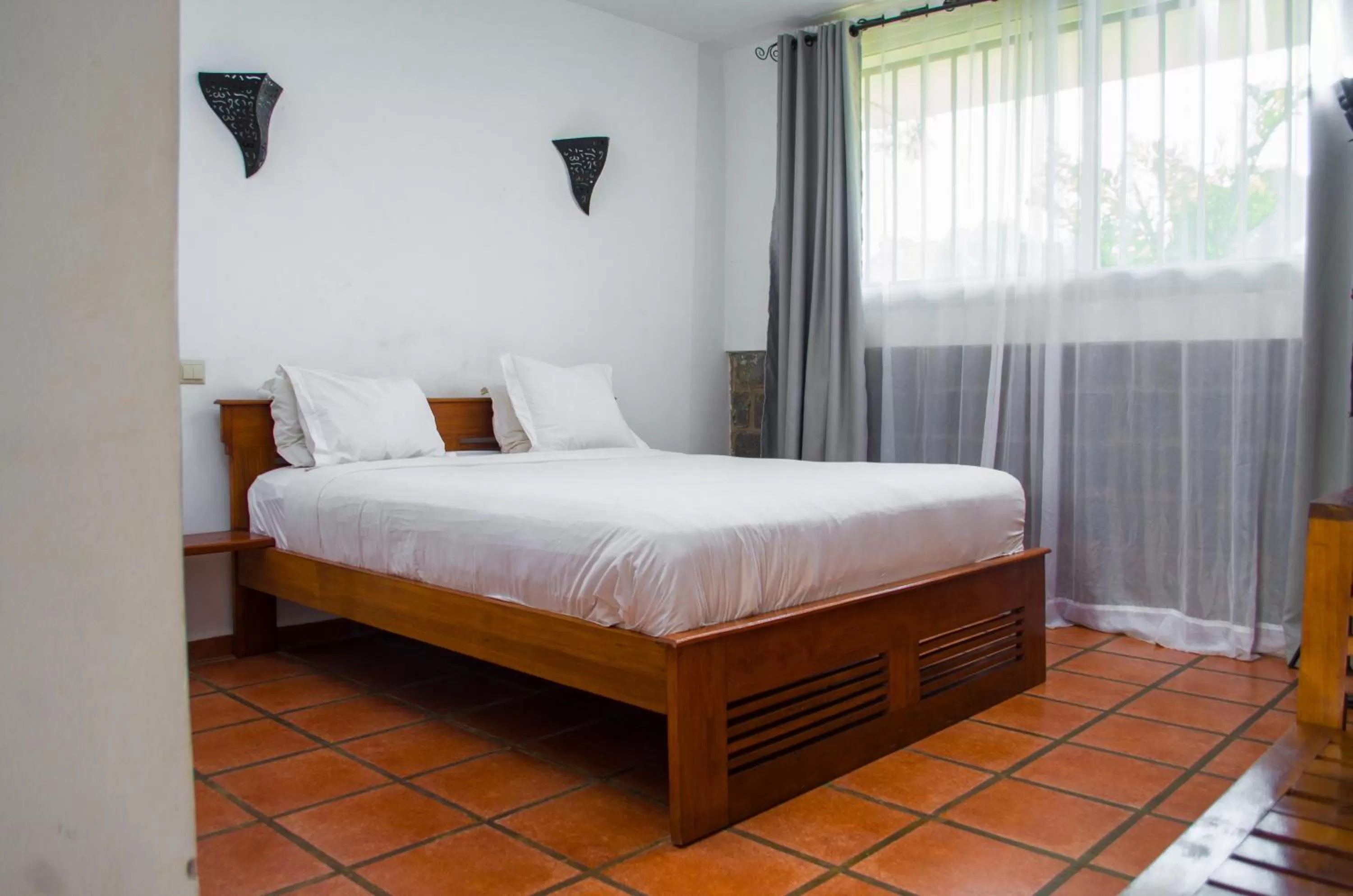 Bed in Ikopa Hôtel Madagascar