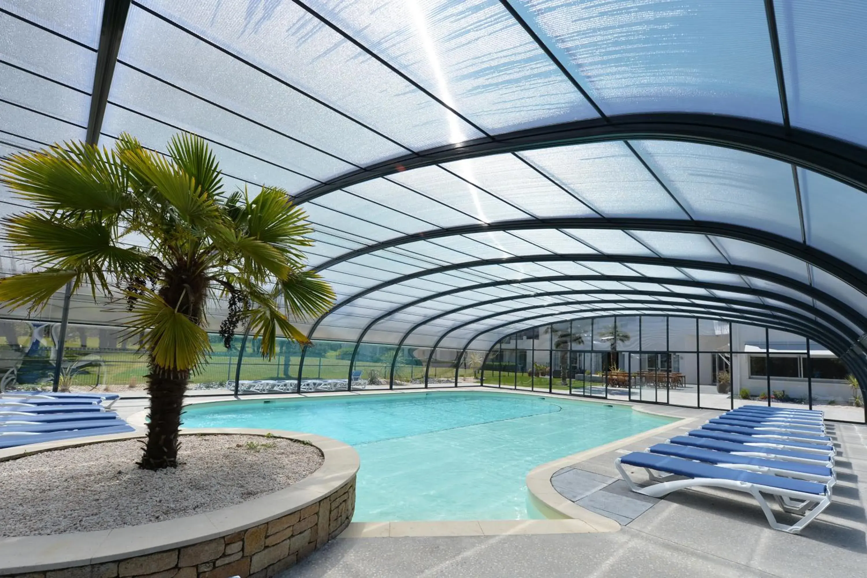 Swimming Pool in Hôtel du Golf Saint-Laurent