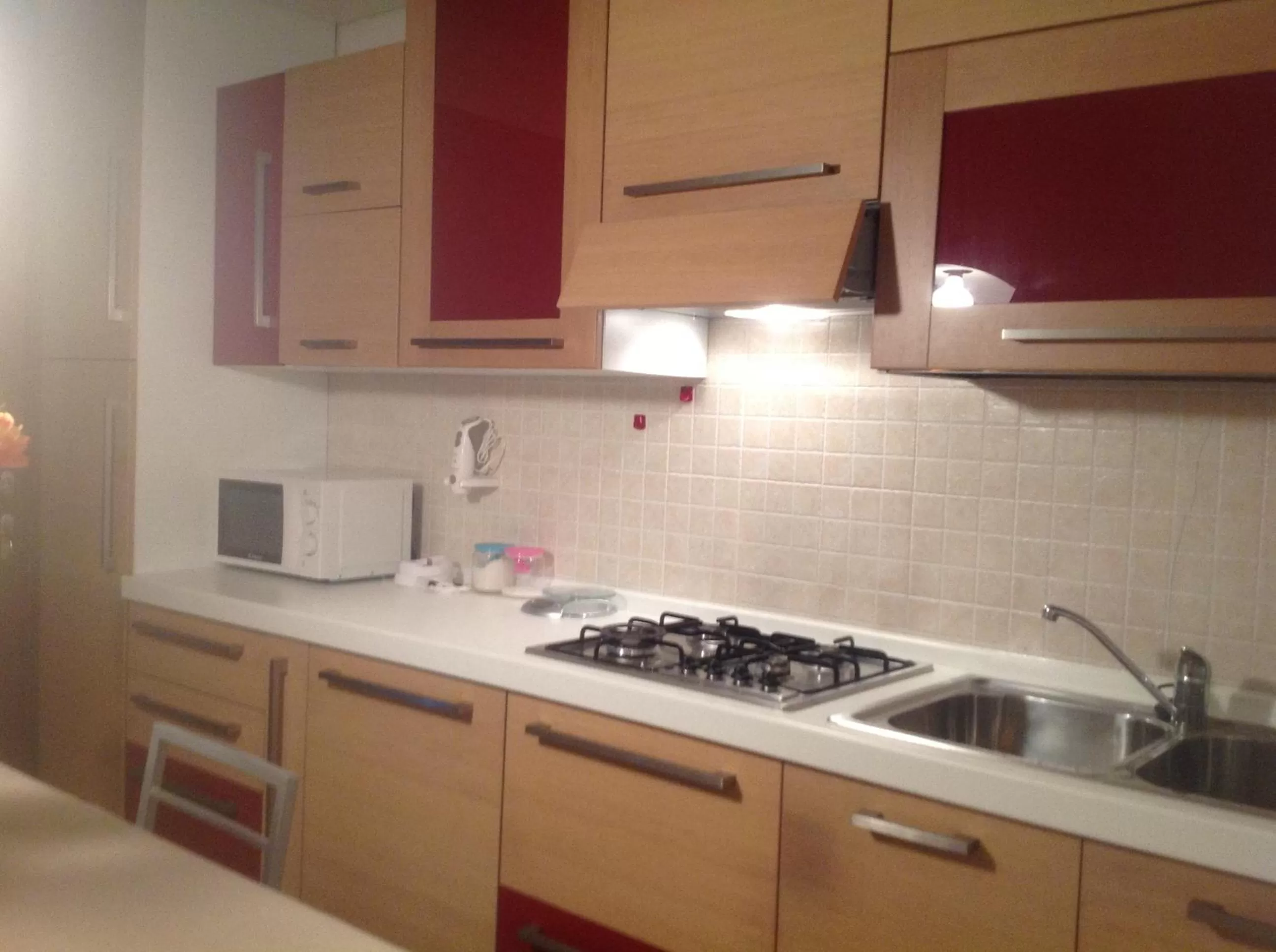 Kitchen/Kitchenette in Villaggio dei Fiori Apart- Hotel 3 Stars - Family Resort