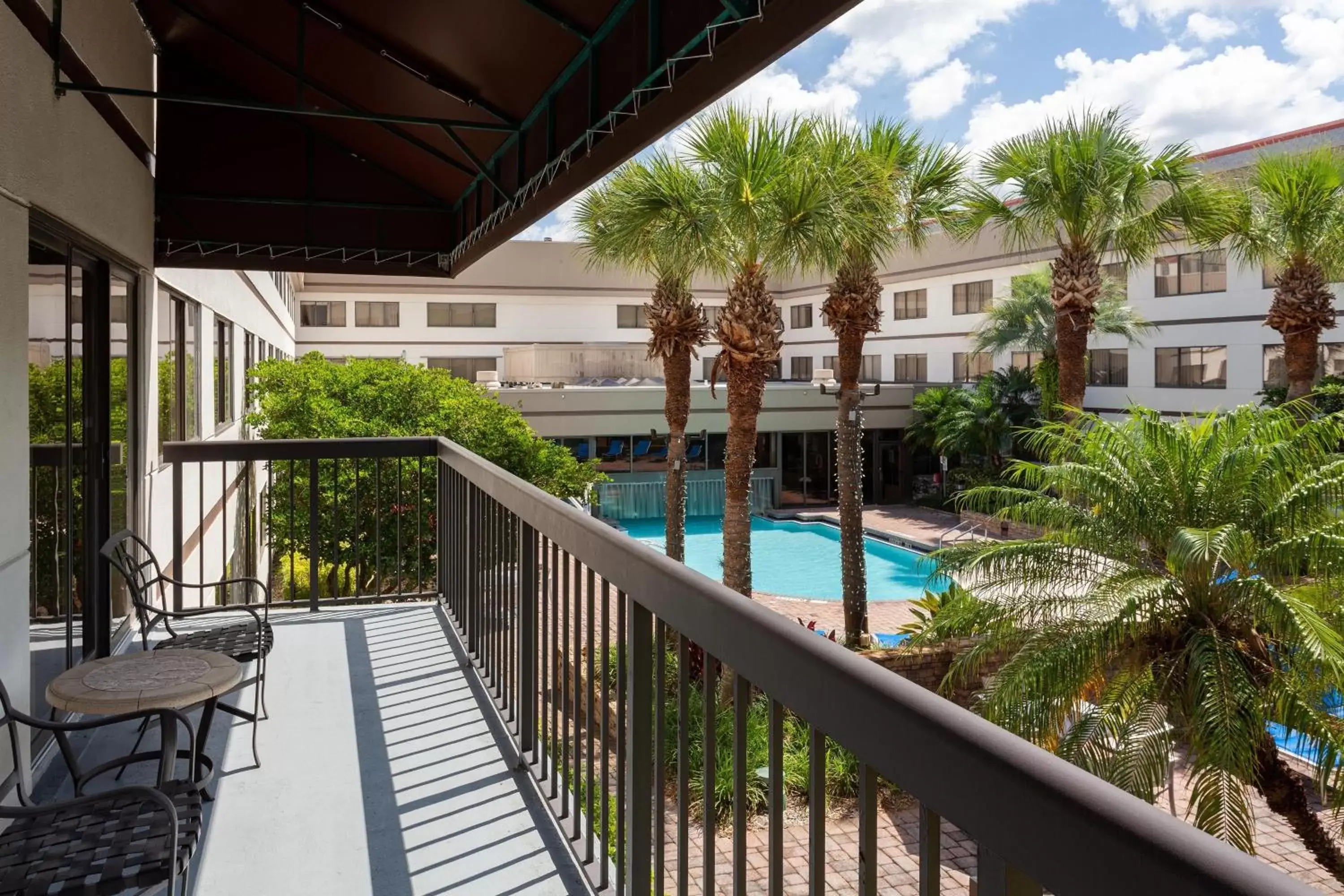 Swimming pool, Balcony/Terrace in Sheraton Suites Orlando Airport Hotel