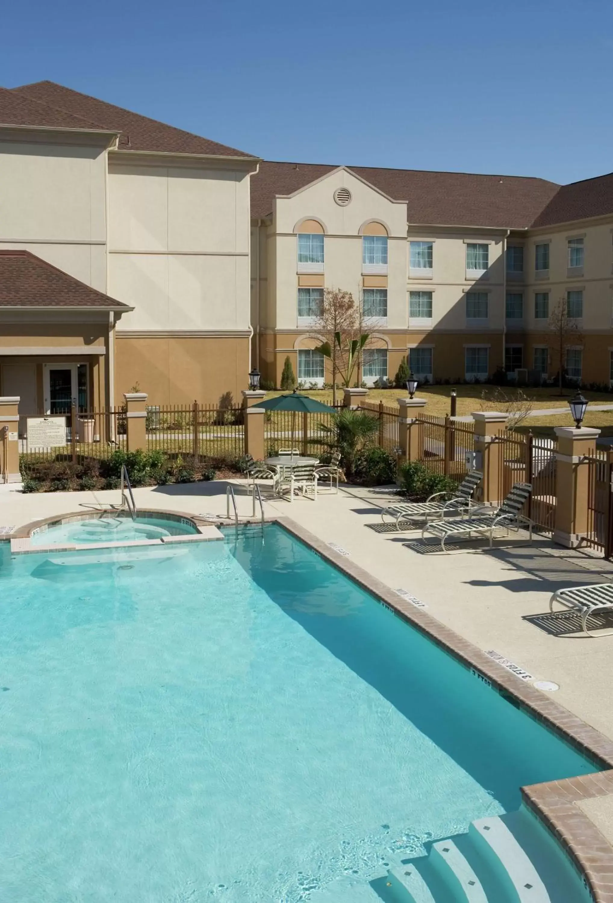 Pool view, Property Building in Homewood Suites Laredo at Mall Del Norte