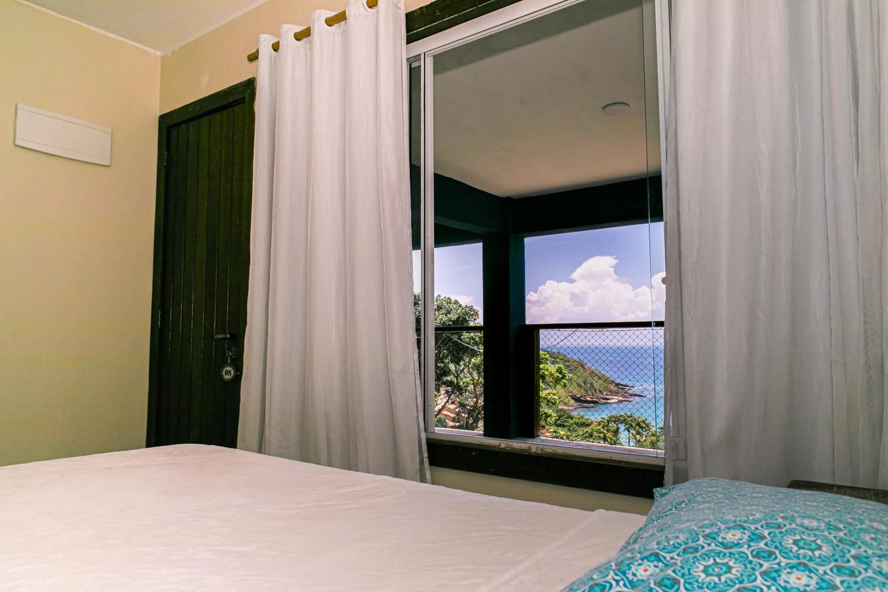 Bed in Pousada La Dolce Vita