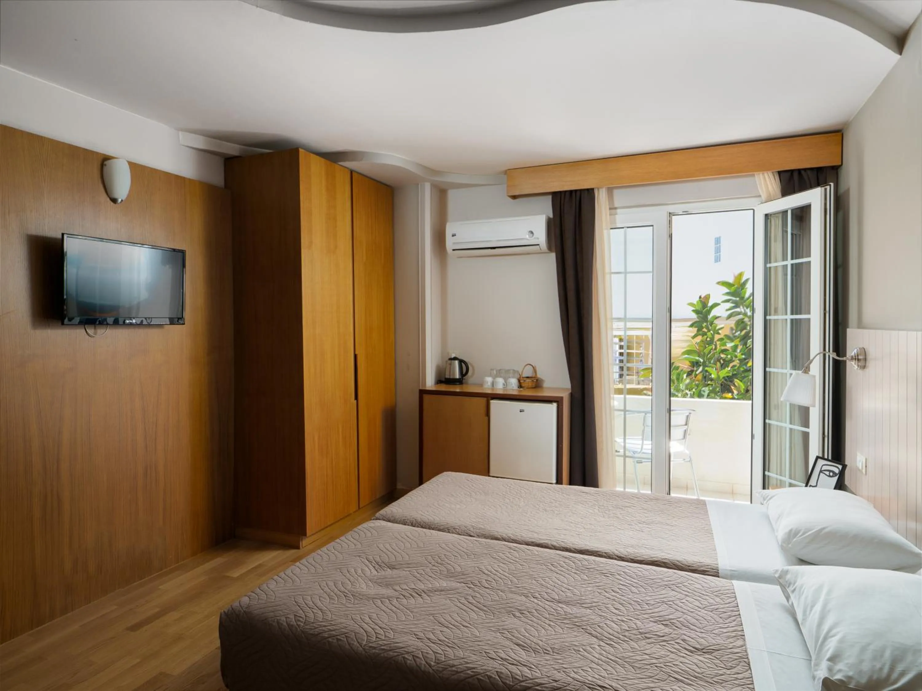 Bed in El Greco Hotel