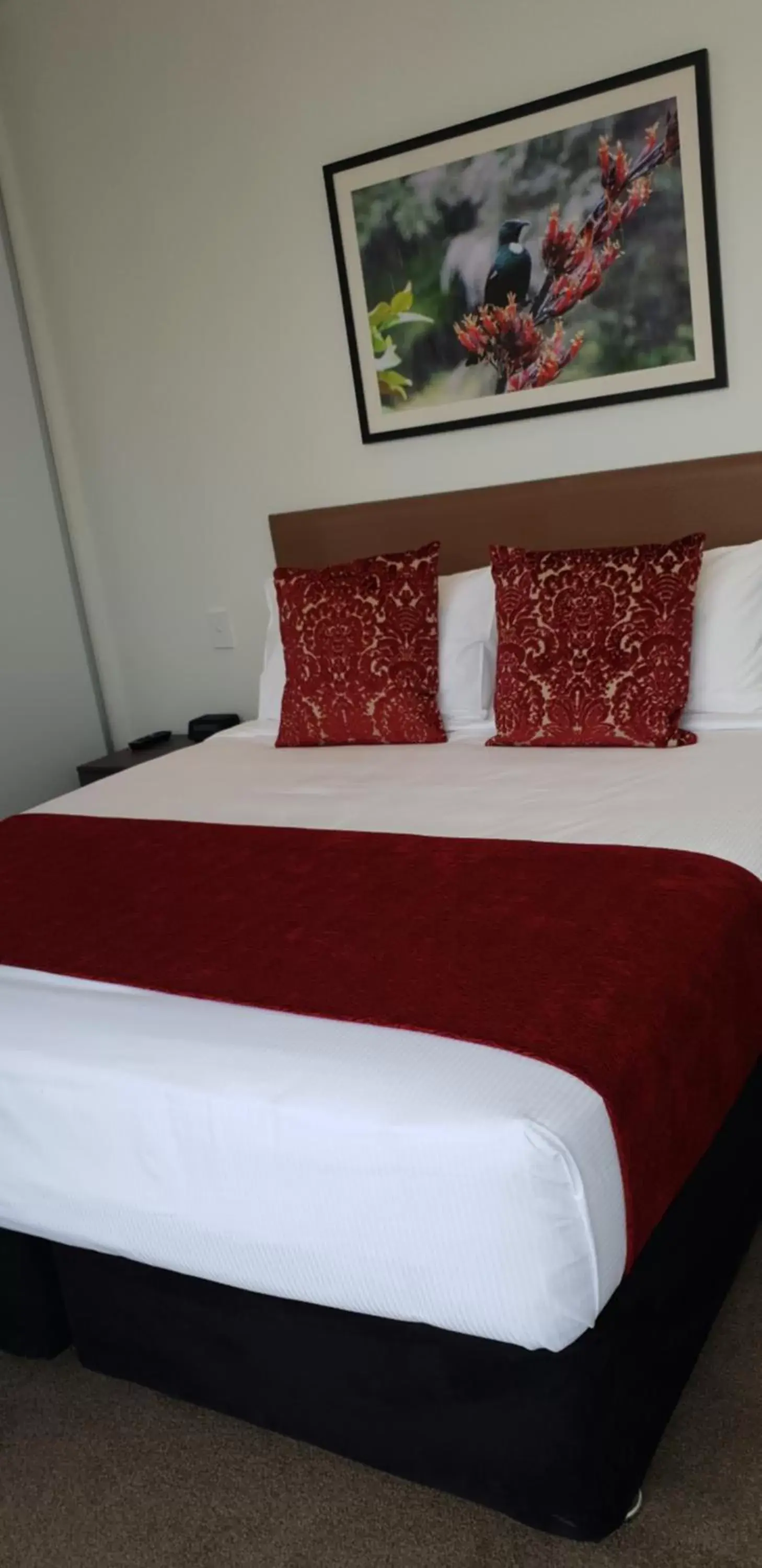 Bed in Ramada Suites by Wyndham Manukau