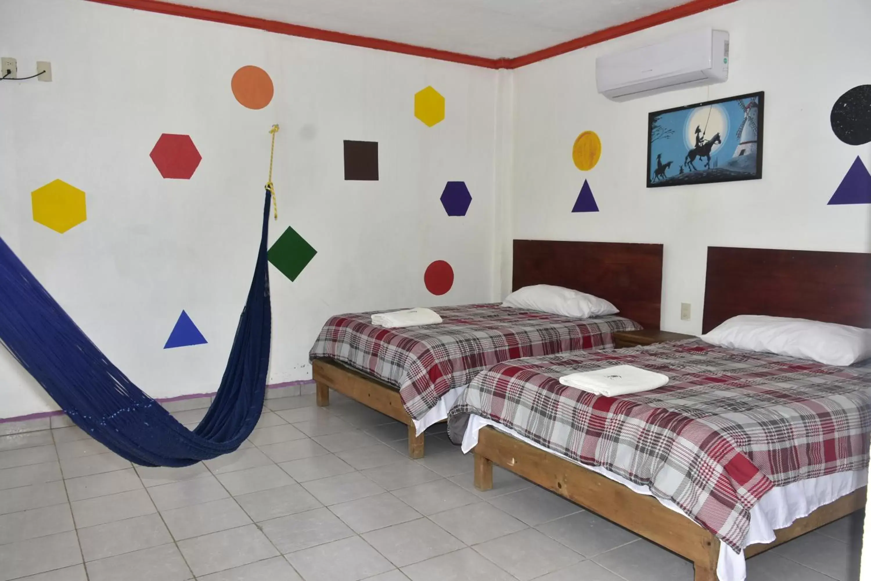 Bed in Hotel Bacaanda