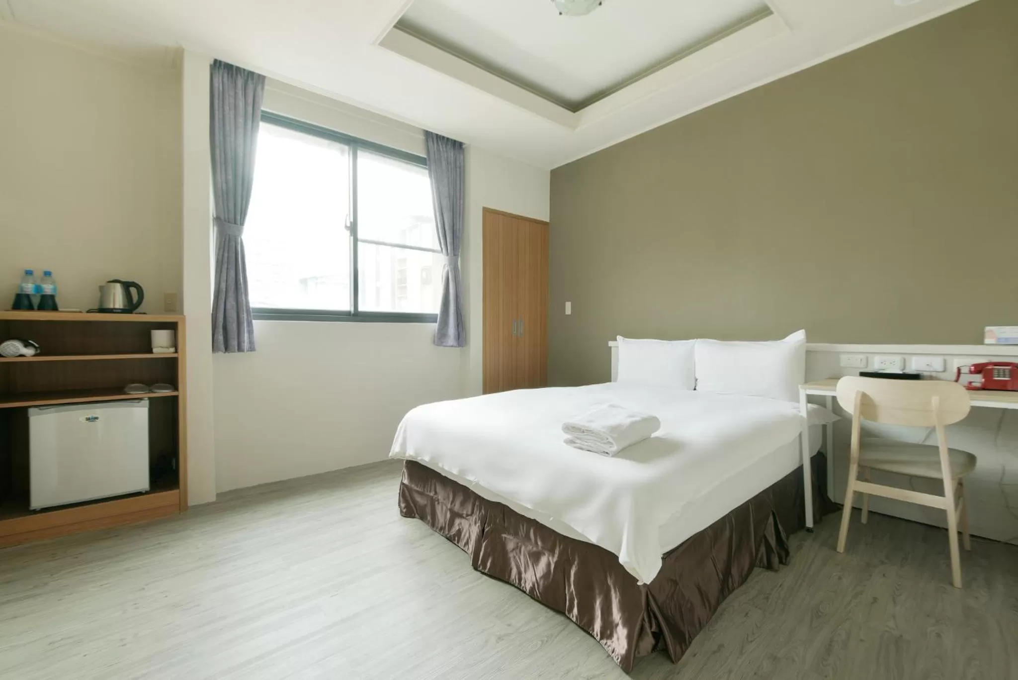 Bed in Raise Hotel Taichung