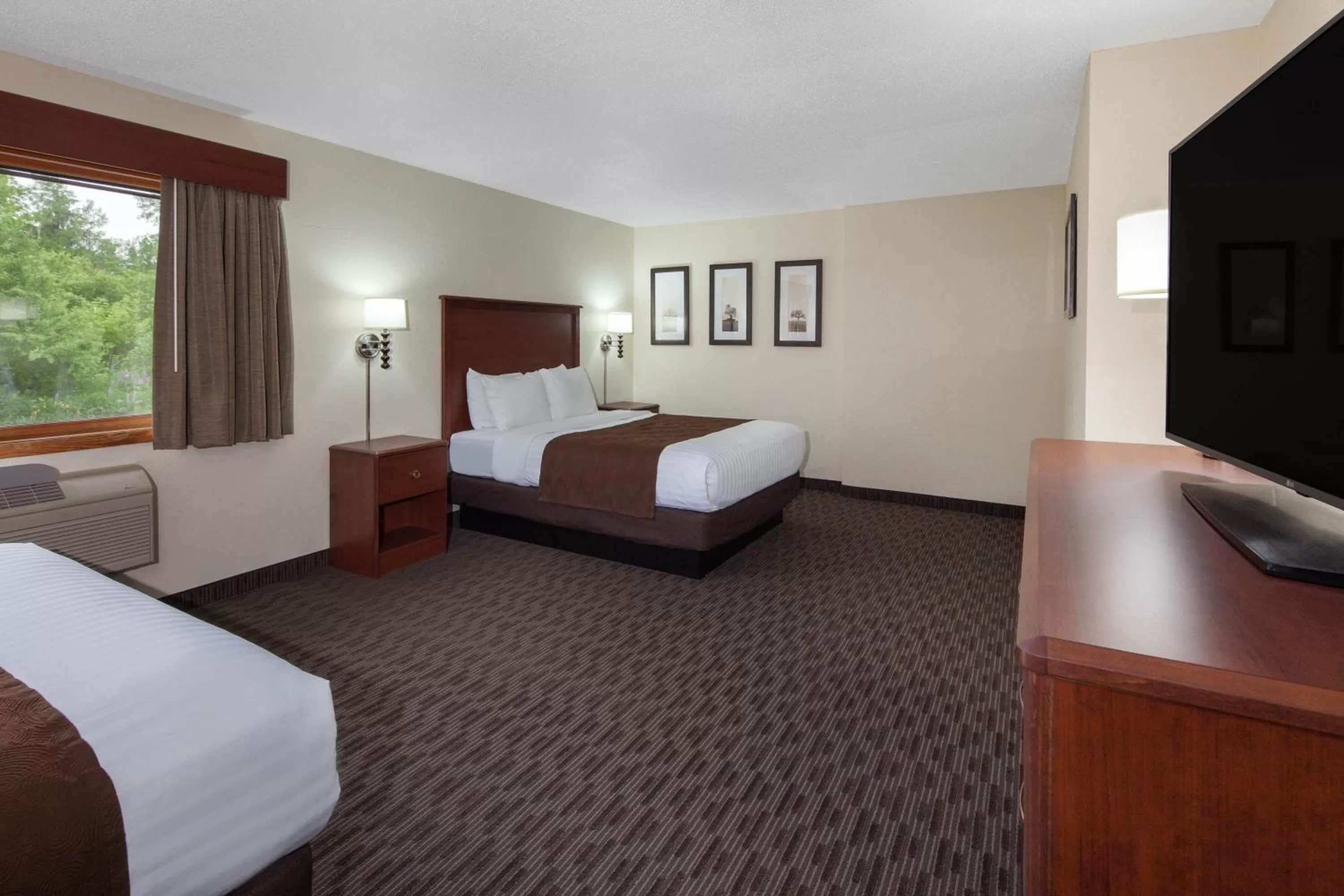 Photo of the whole room, Bed in AmericInn by Wyndham Ironwood