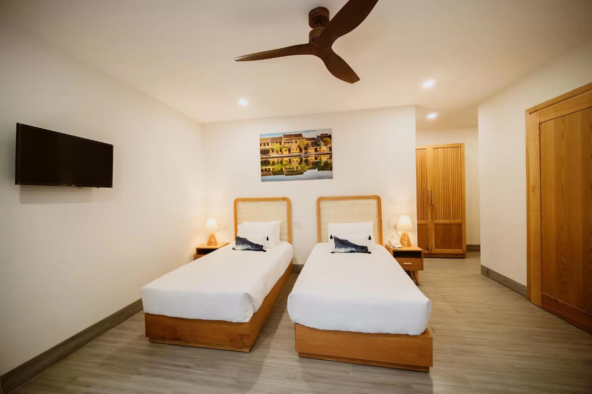 Bed in The Watermark Beachside Hotel