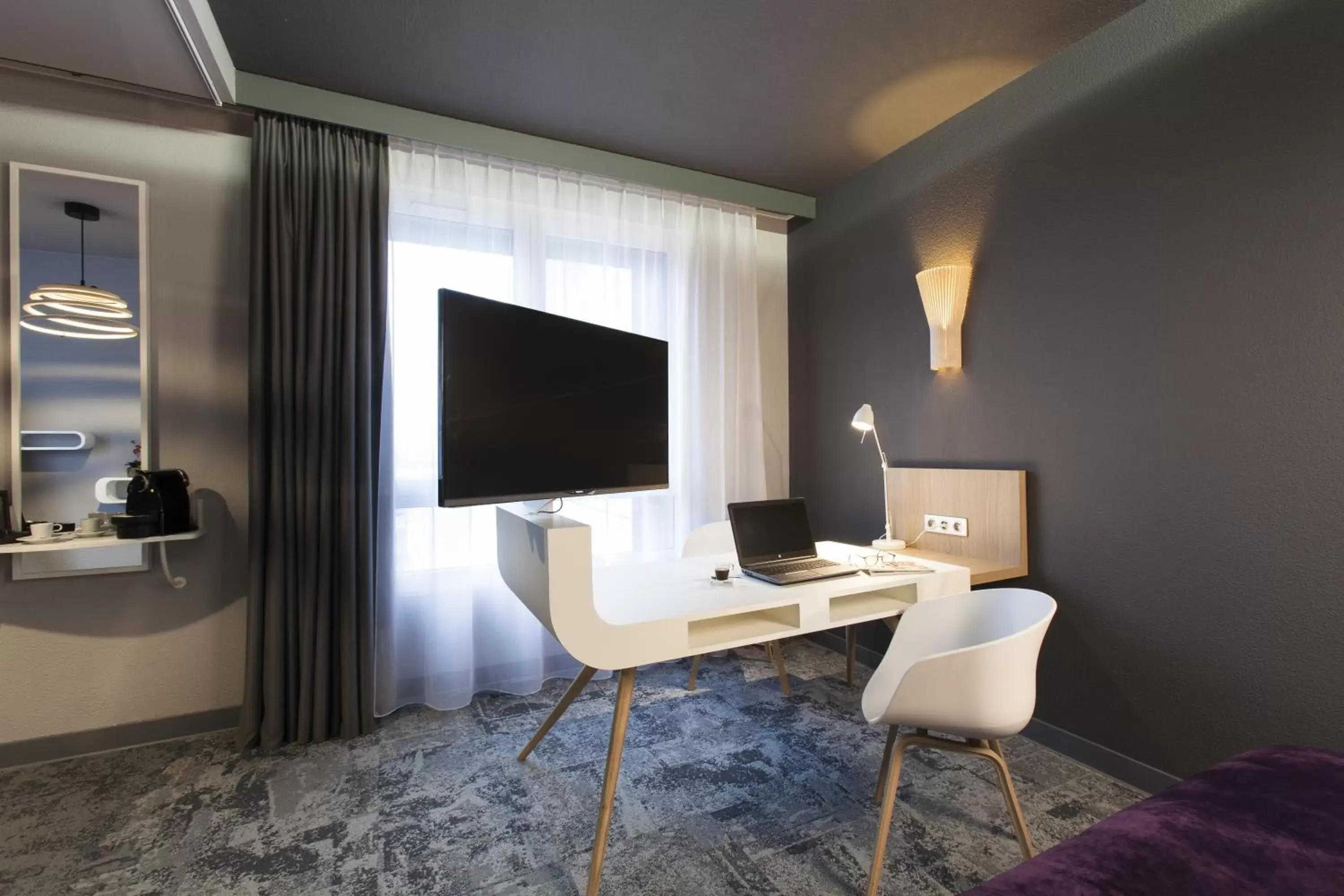 TV and multimedia, TV/Entertainment Center in Mercure La Roche Sur Yon