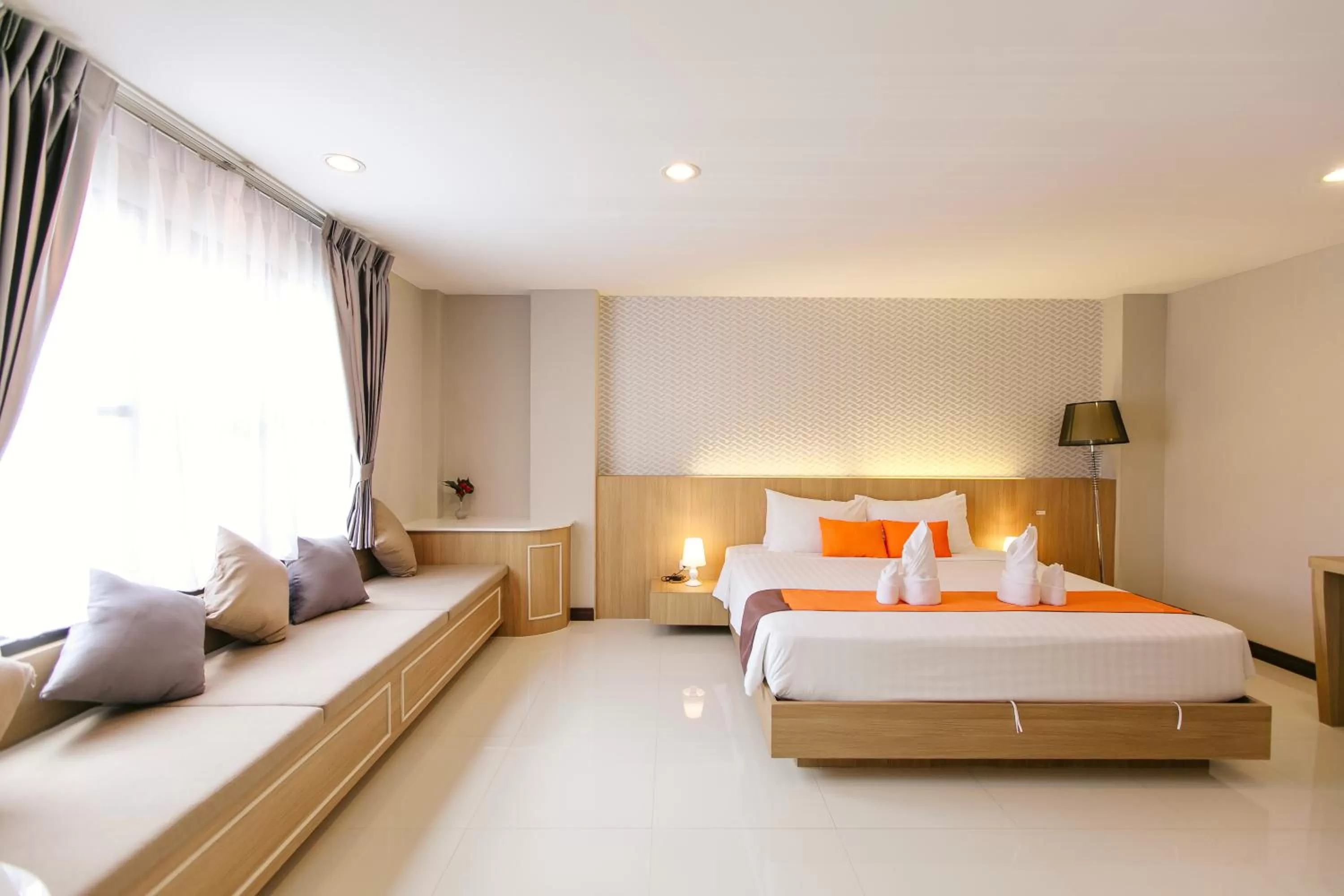 Bed in De Hug Hotel & Residence