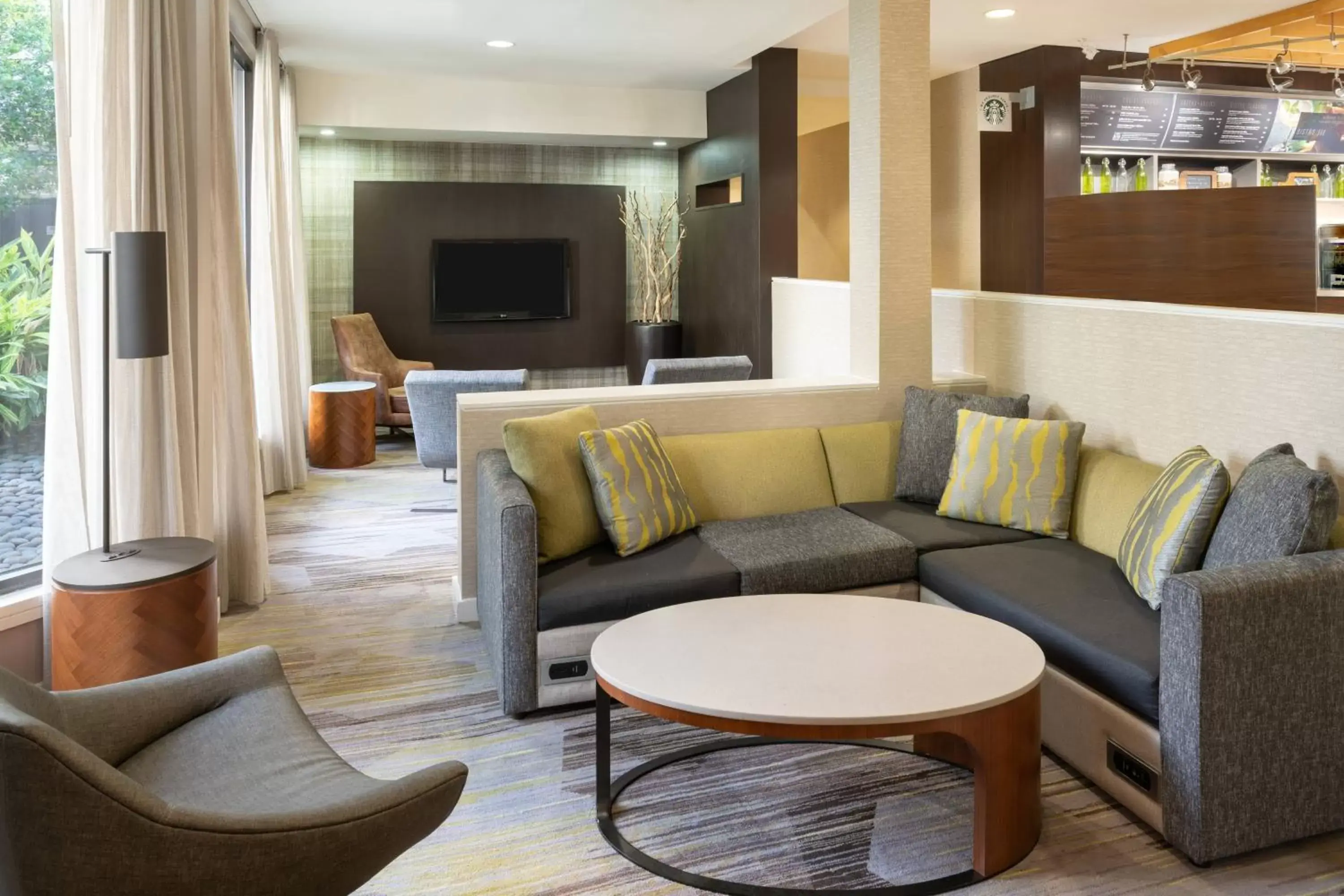 Lobby or reception, Seating Area in Courtyard by Marriott Orlando Airport