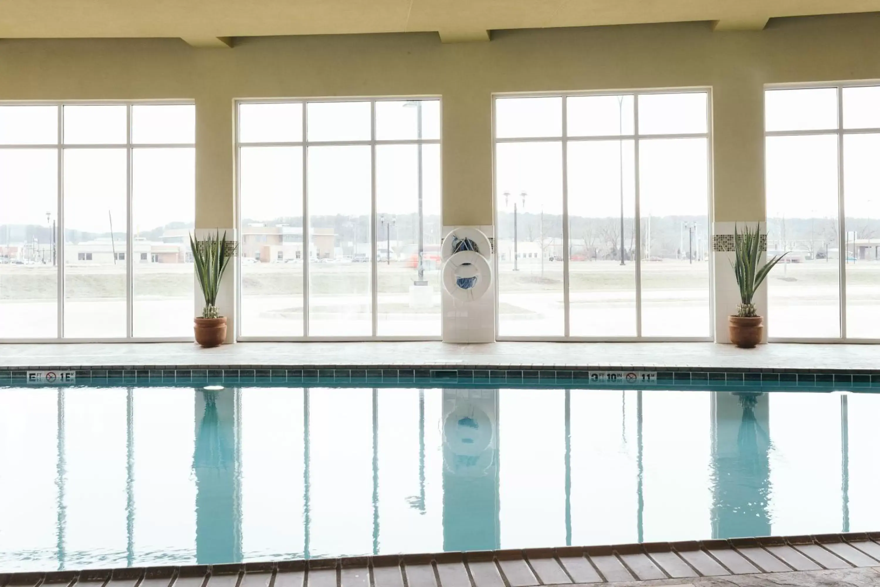 Swimming Pool in Holiday Inn and Suites East Peoria, an IHG Hotel