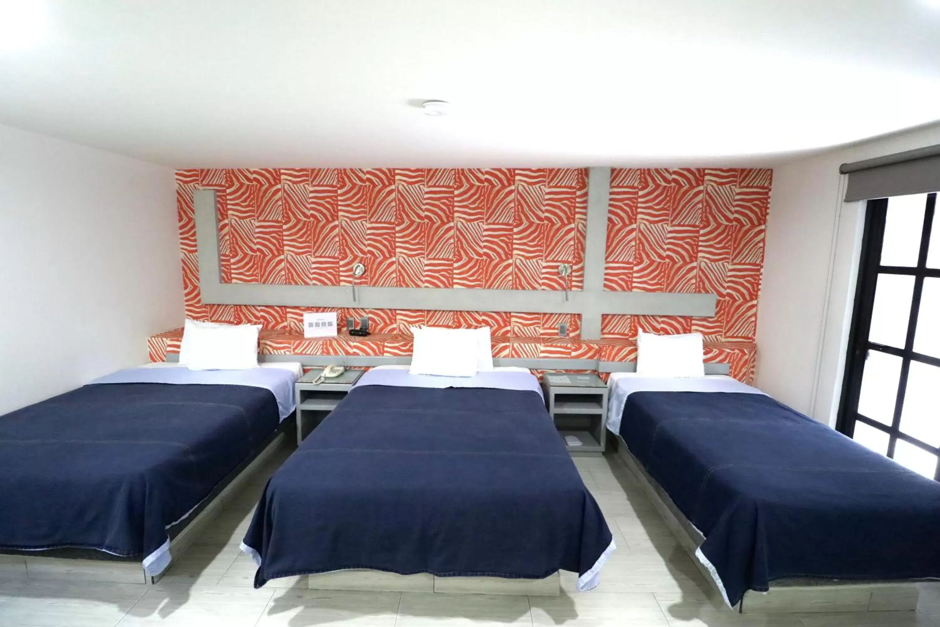 Bed in Hotel Posada Tulancingo