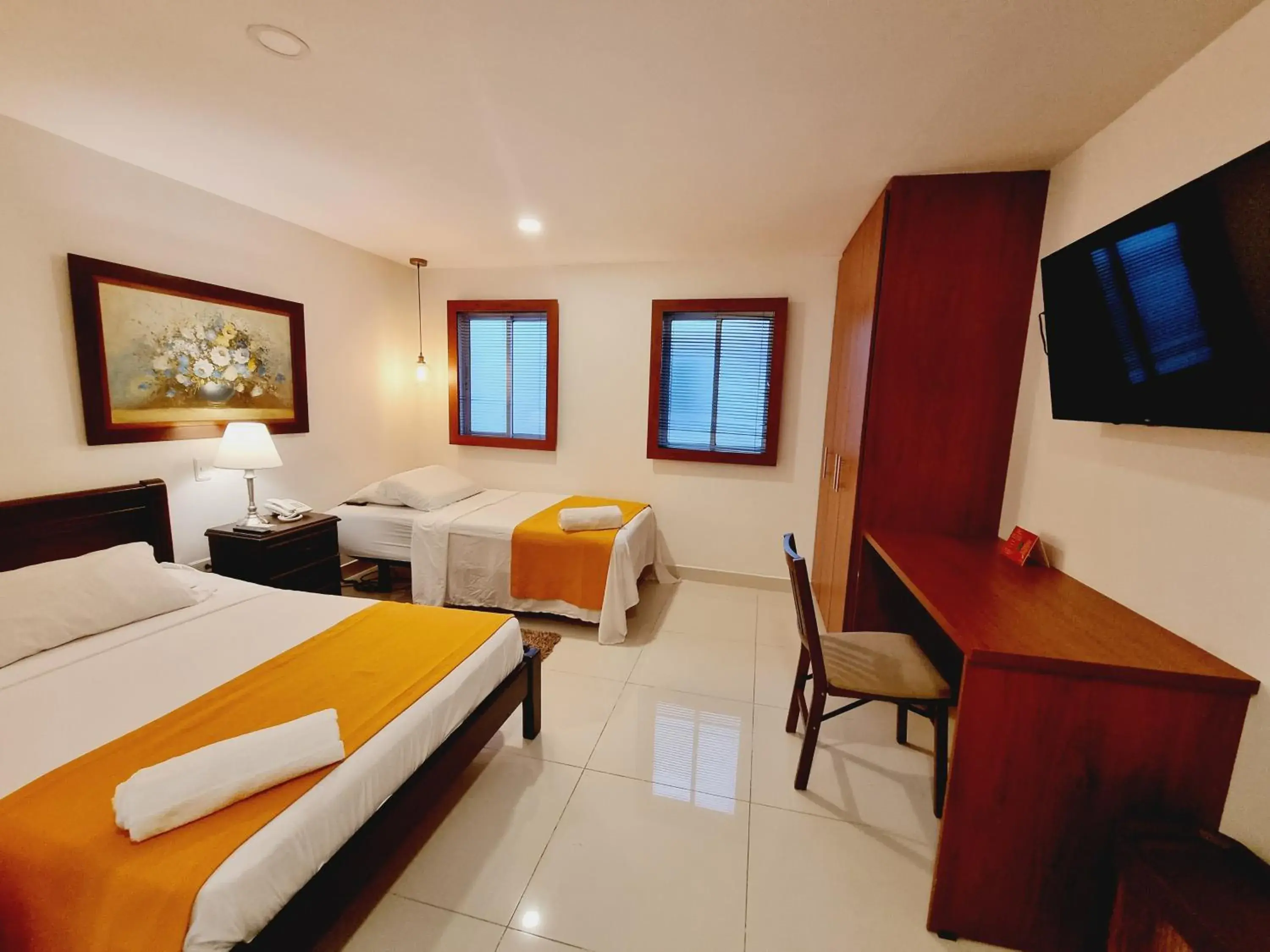 Bedroom, TV/Entertainment Center in Hotel Karlo