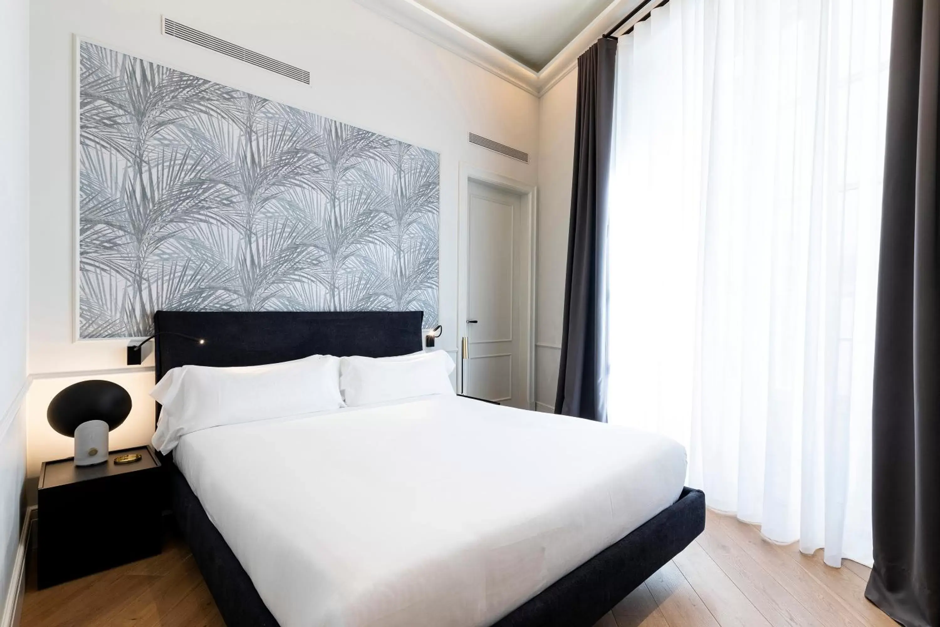 Bed in Maldà Singular Hotel