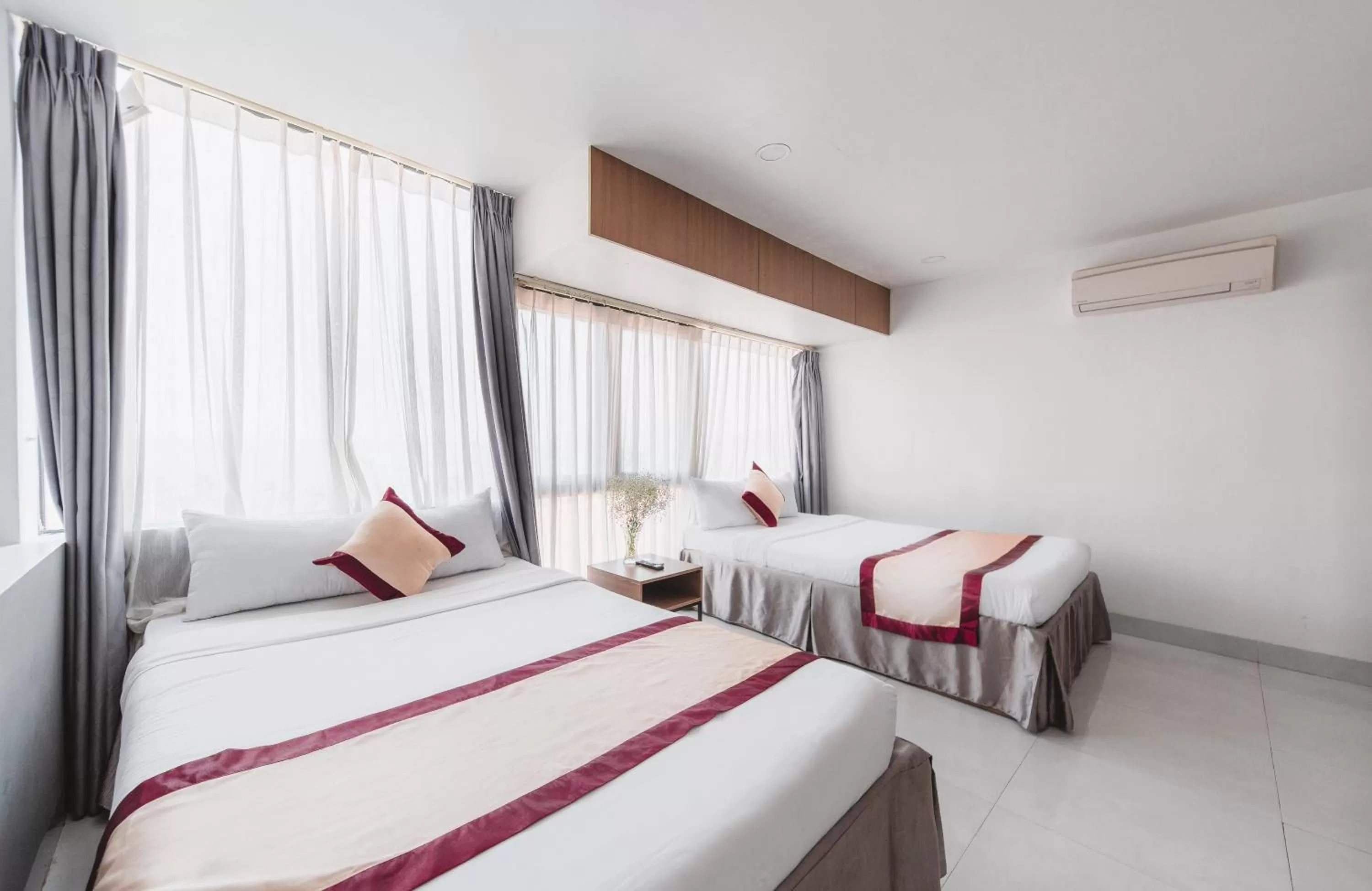 Bed in Arise Seaside Hotel