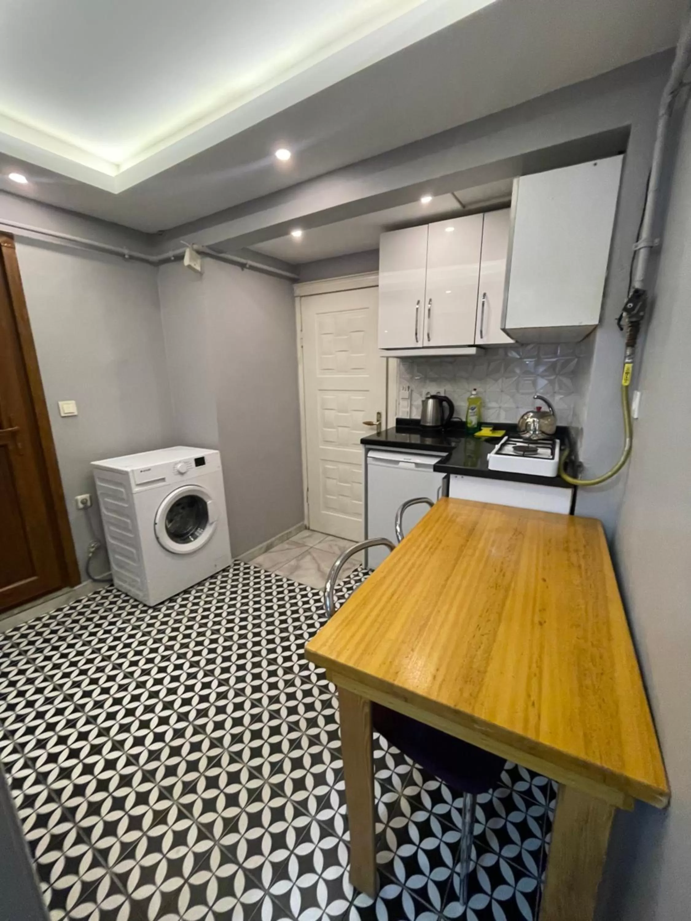 Kitchen or kitchenette in Arat Apartments