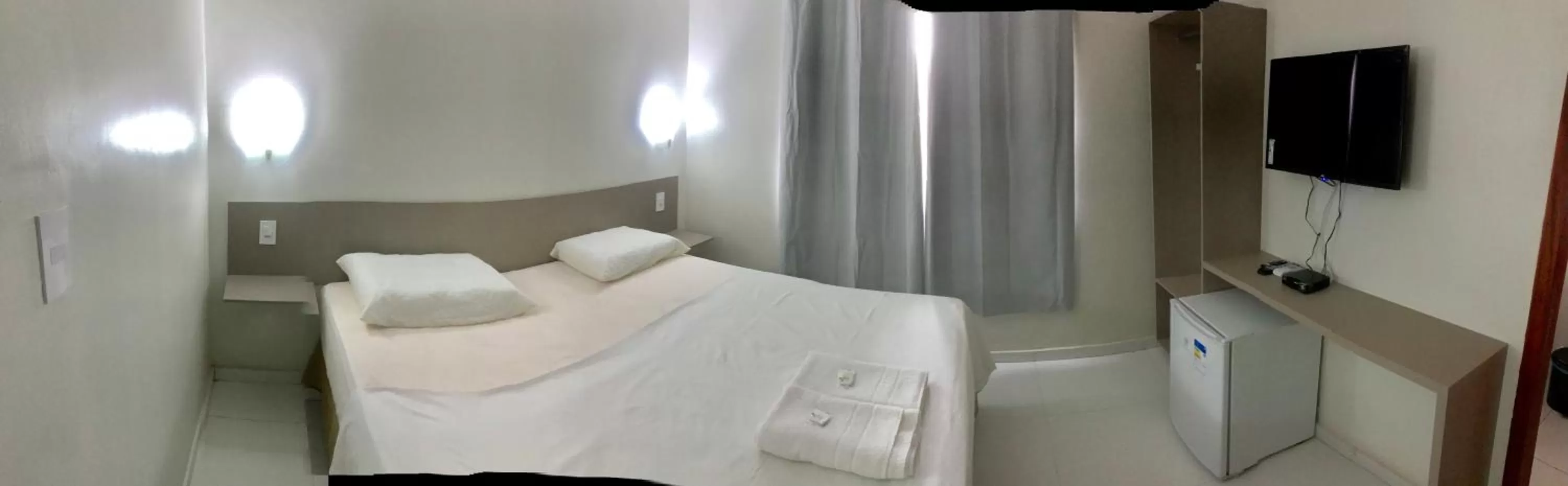 Bed in Pousada Vila do Carmo