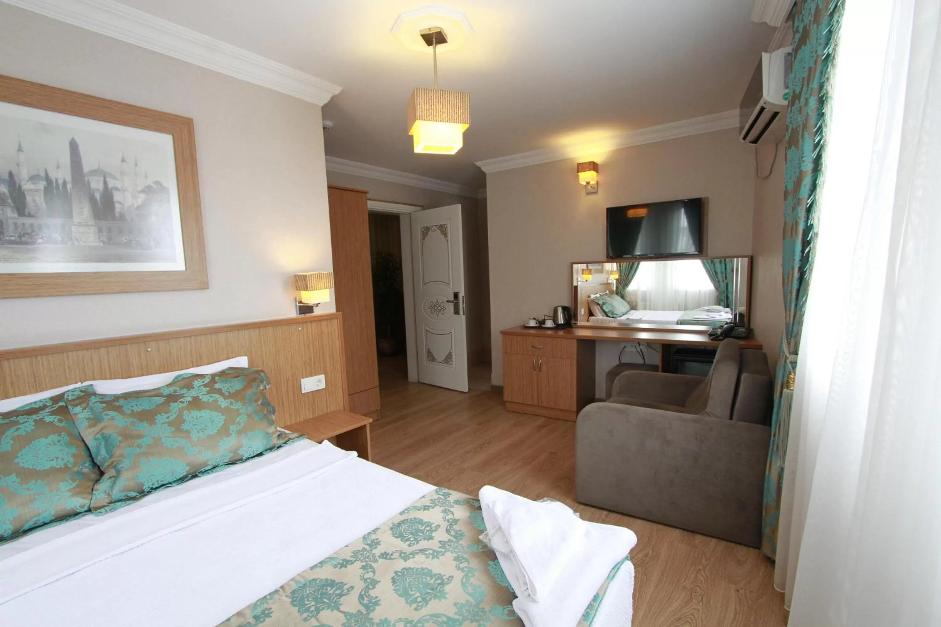 Bed in Agora Boutique Hotel & Bistro