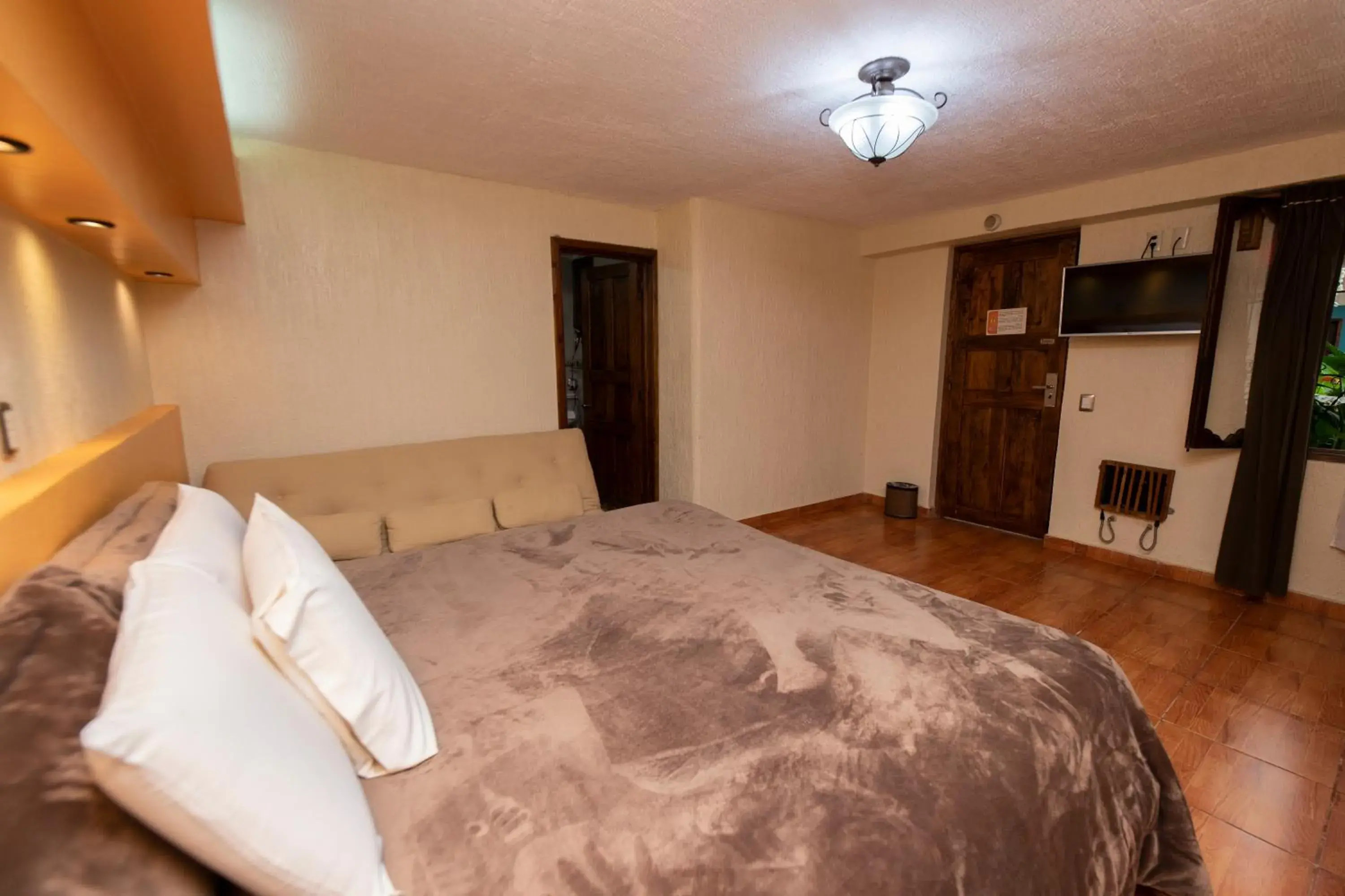 Bed in Gran Hotel El Encanto Bed in Gran Hotel El Encanto