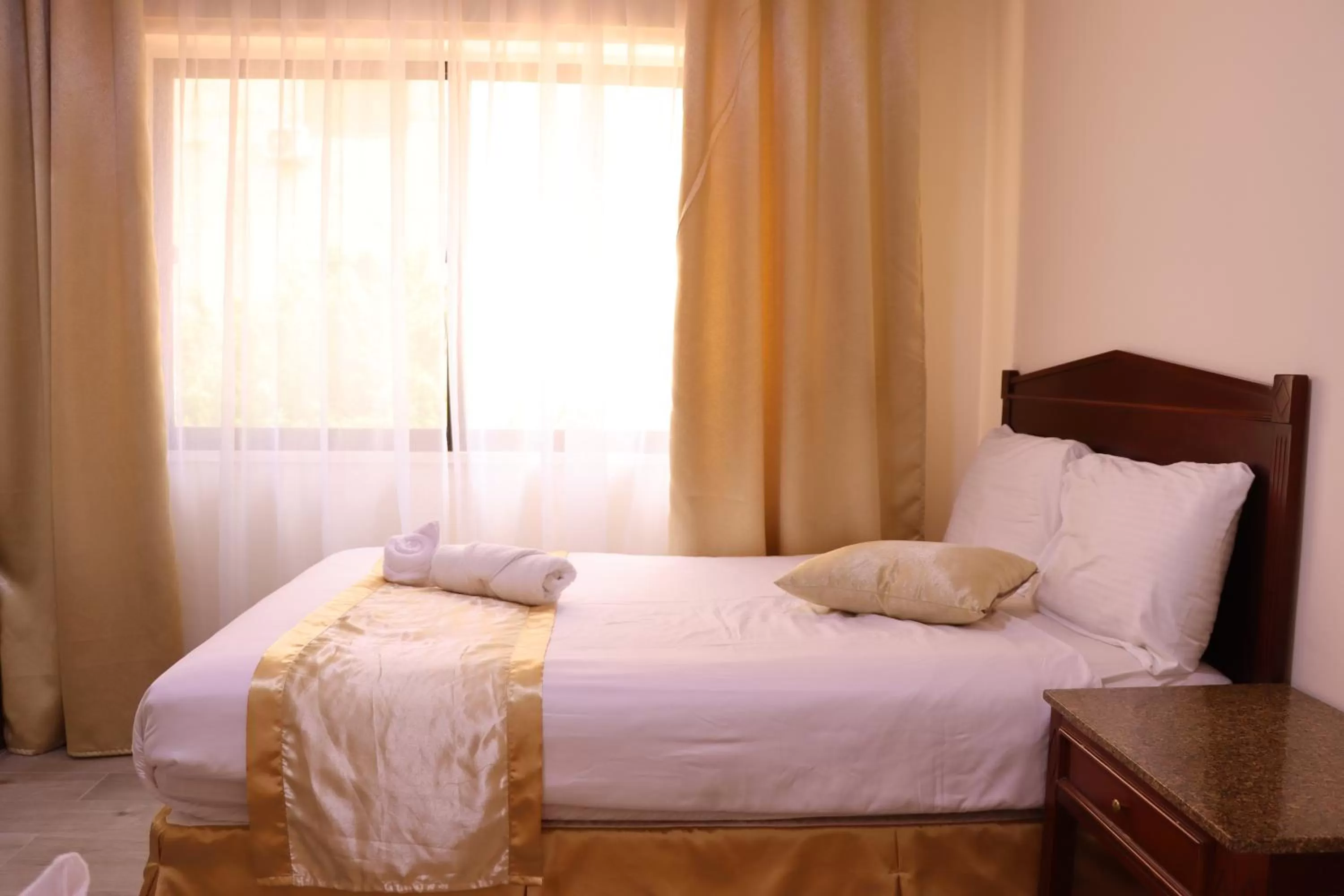 Bed in Al Jamal Suites