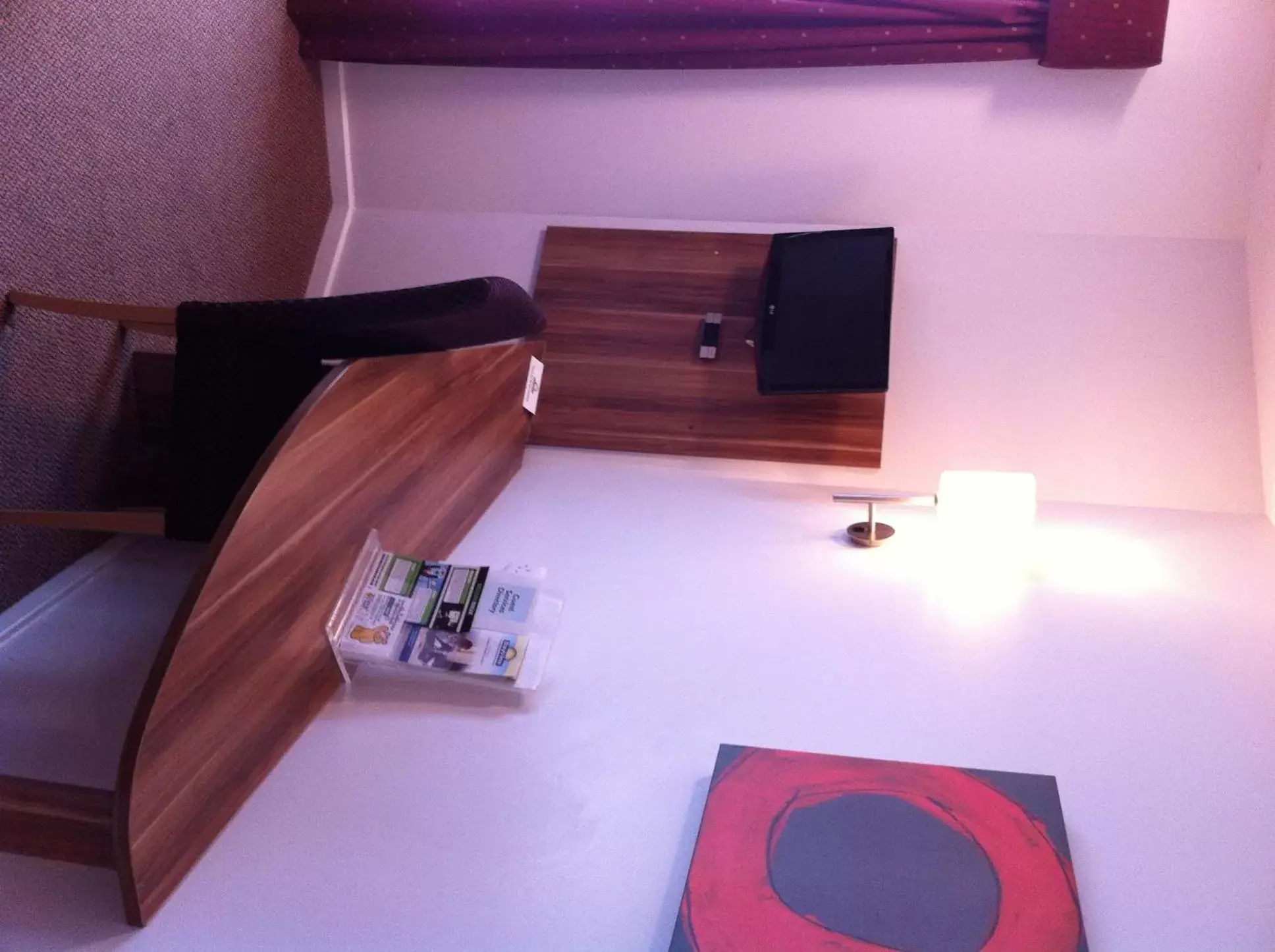 Seating area, TV/Entertainment Center in Ramada London Stansted Airport