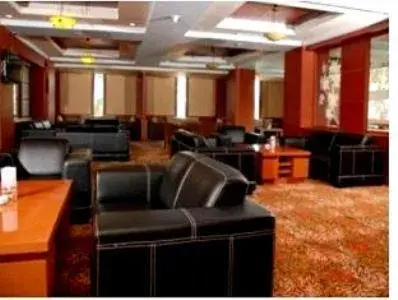 Communal lounge/ TV room in Abadi Suite Hotel & Tower Jambi by Tritama Hospitality