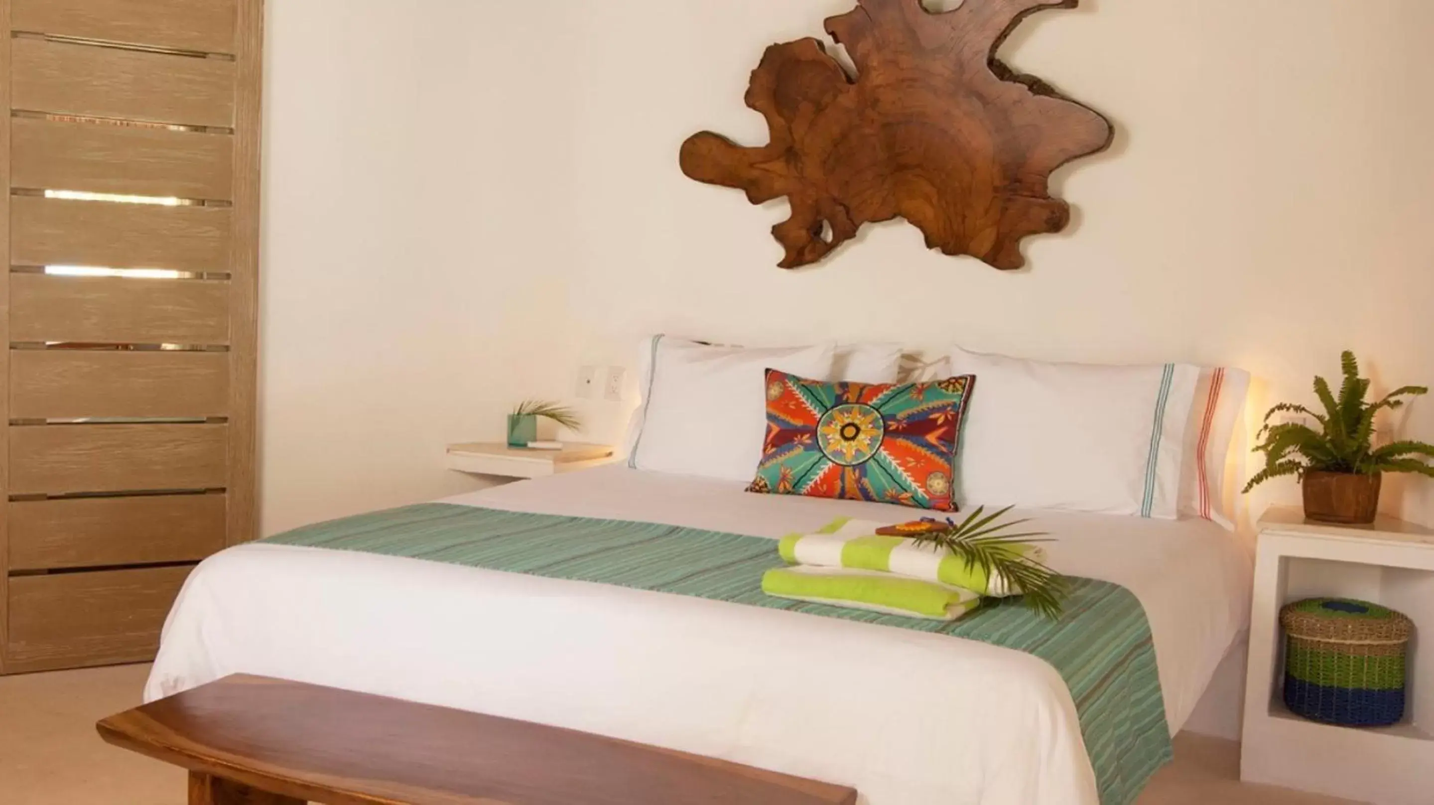 Bed in Mahekal Beach Front Resort & Spa