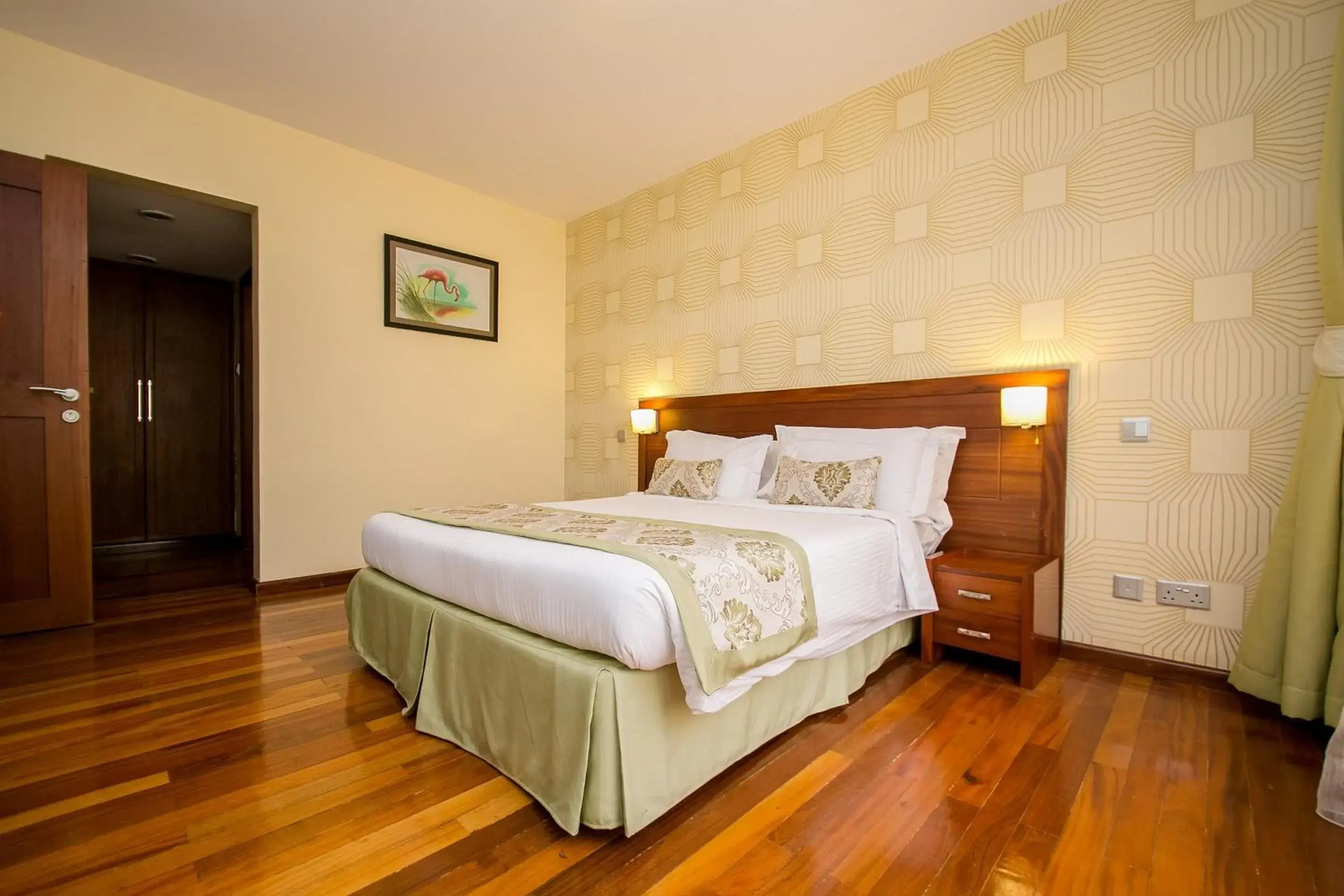 Photo of the whole room, Bed in Waridi Paradise Hotel and Suites