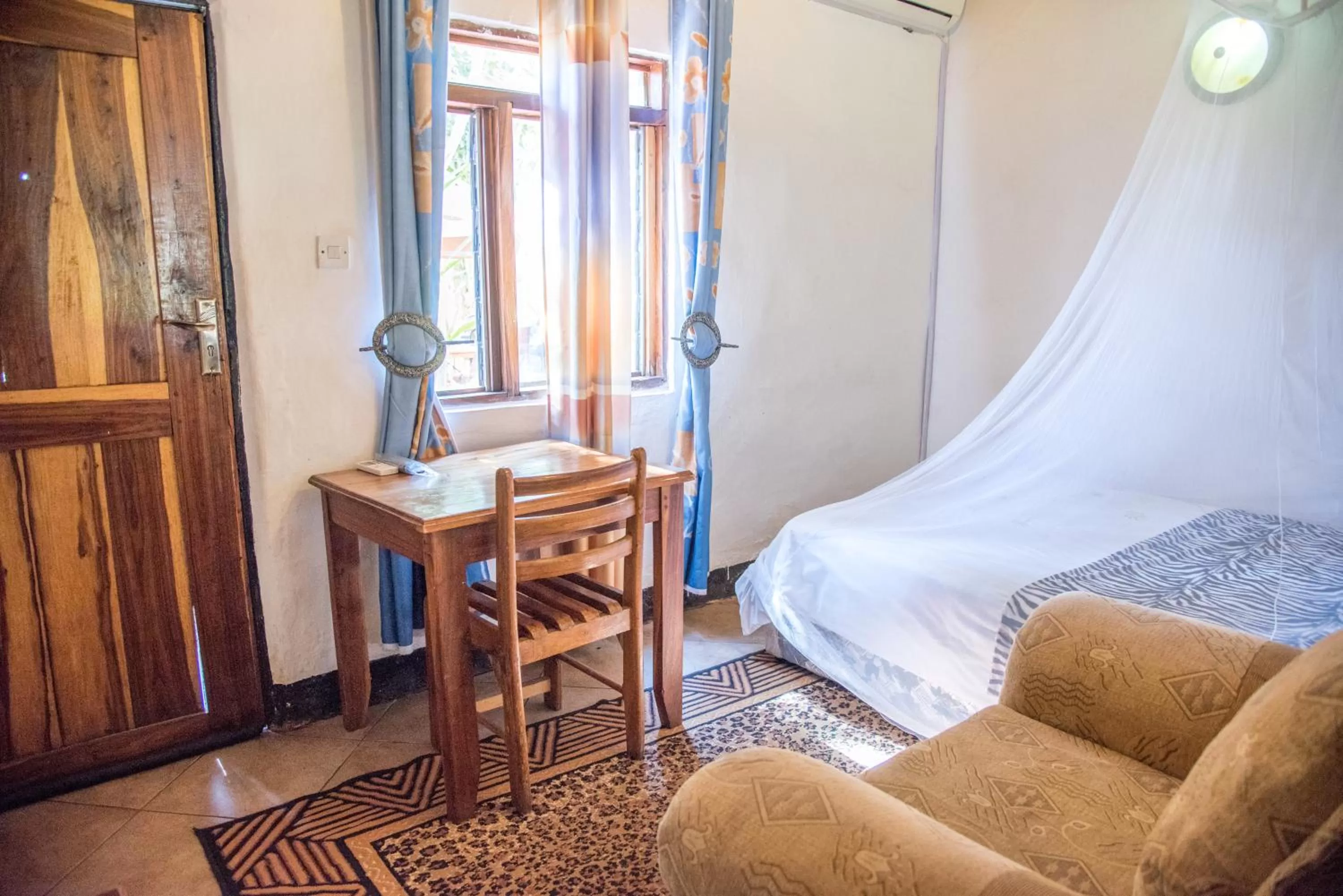 Photo of the whole room, Bed in Okavango Lodge