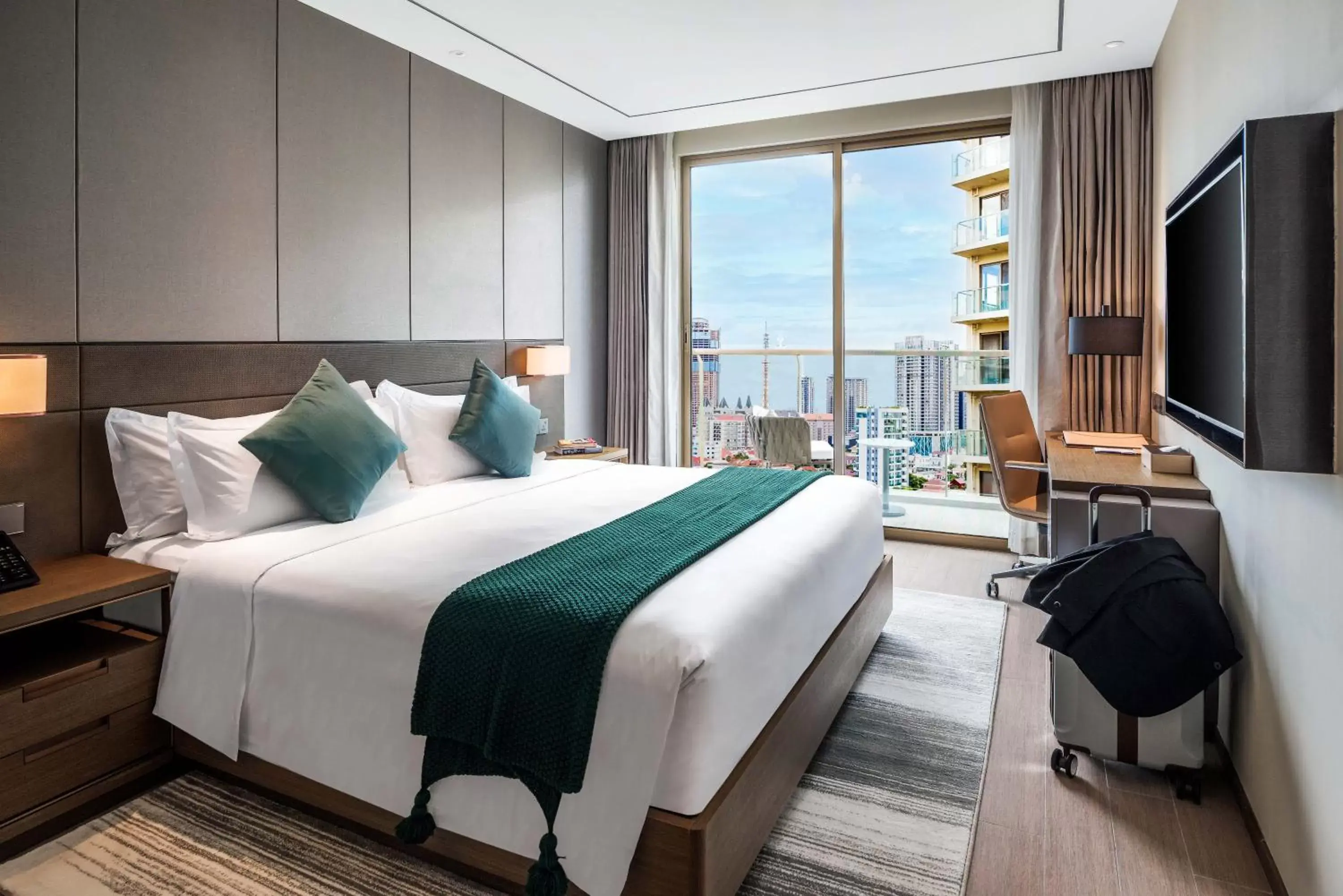 TV and multimedia, Bed in Oakwood Premier Phnom Penh TV and multimedia, Bed in Oakwood Premier Phnom Penh