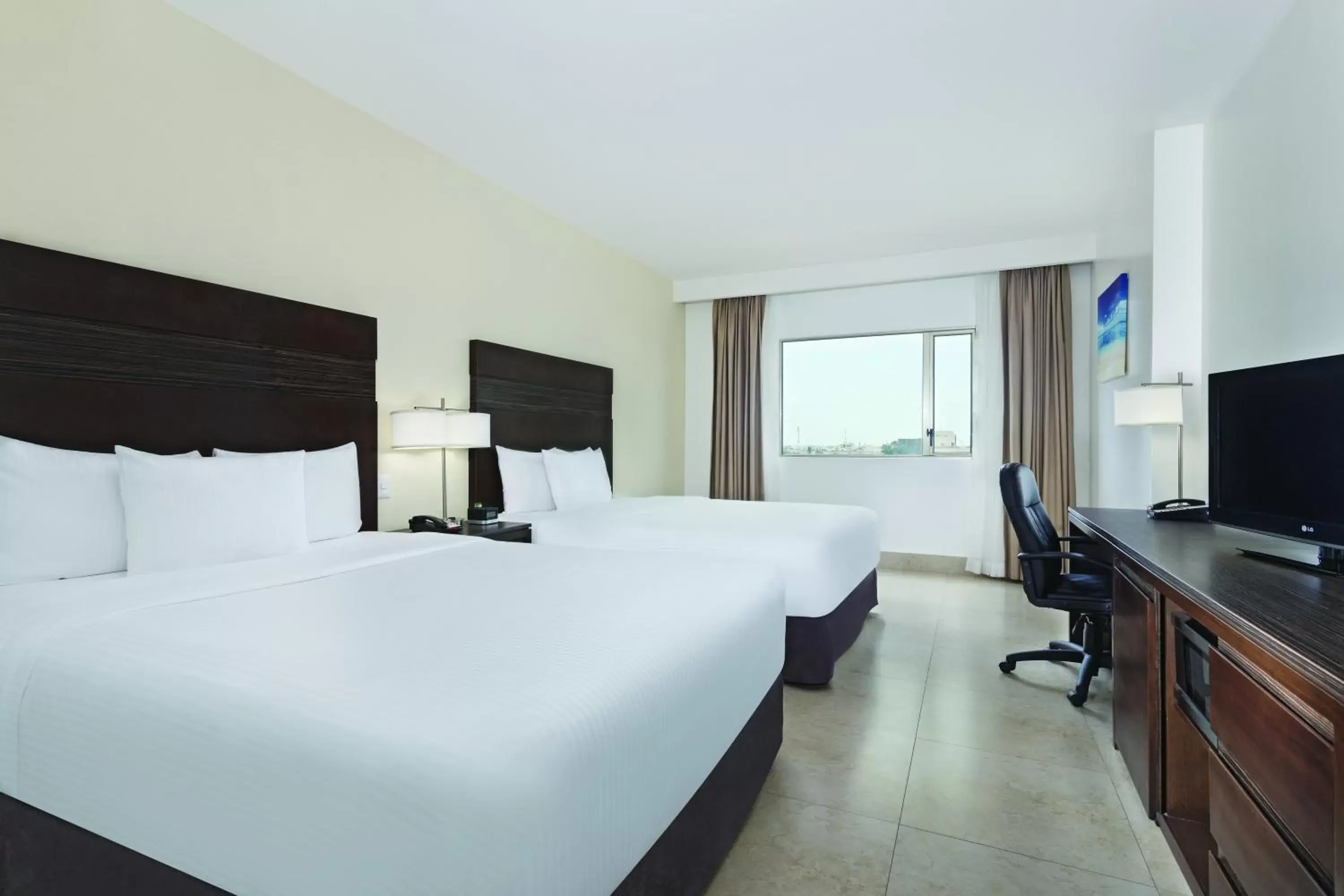 Photo of the whole room in Wyndham Garden Cancun Downtown