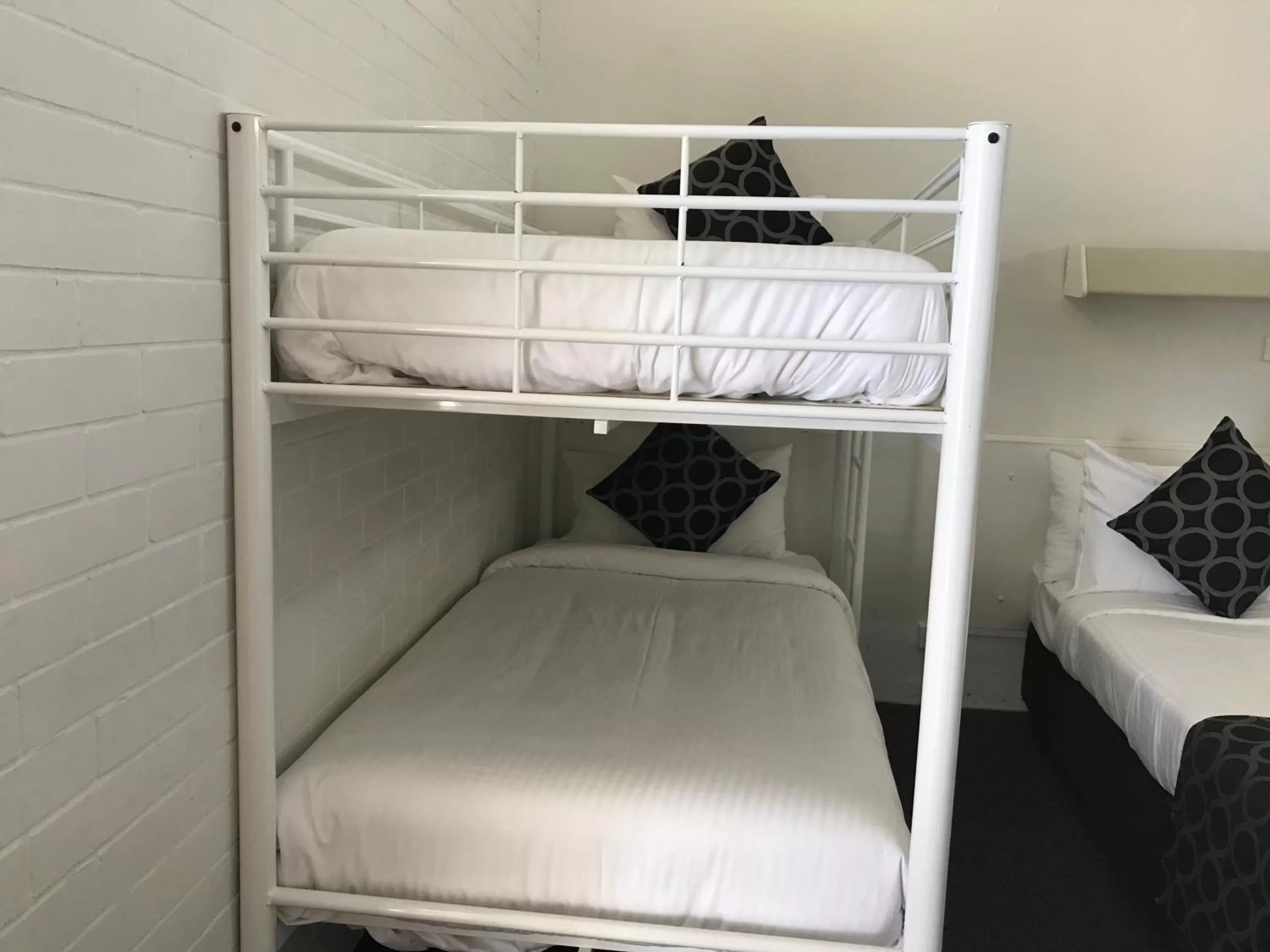 Bed in Coffs Shearwater Motel