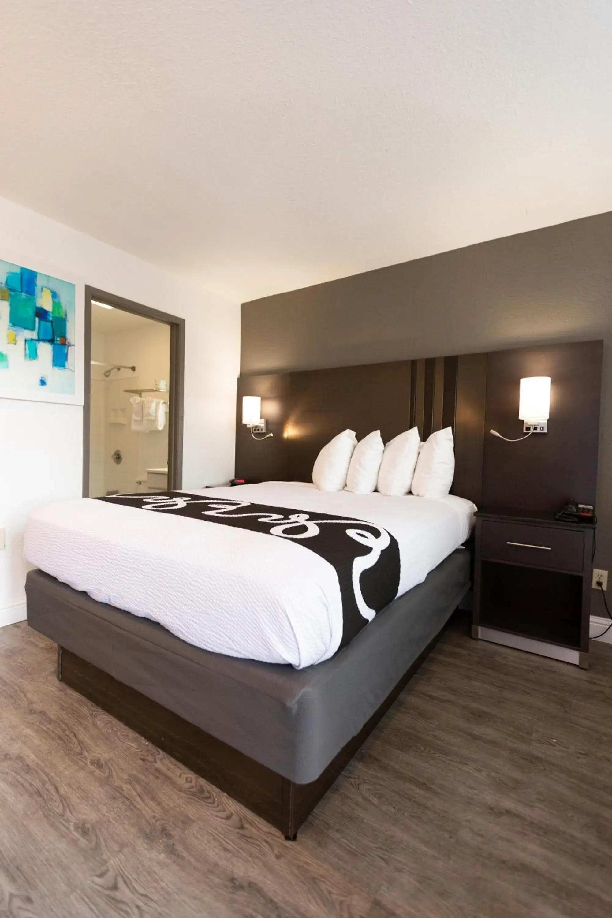 Bed in SureStay Hotel by Best Western Seaside Monterey